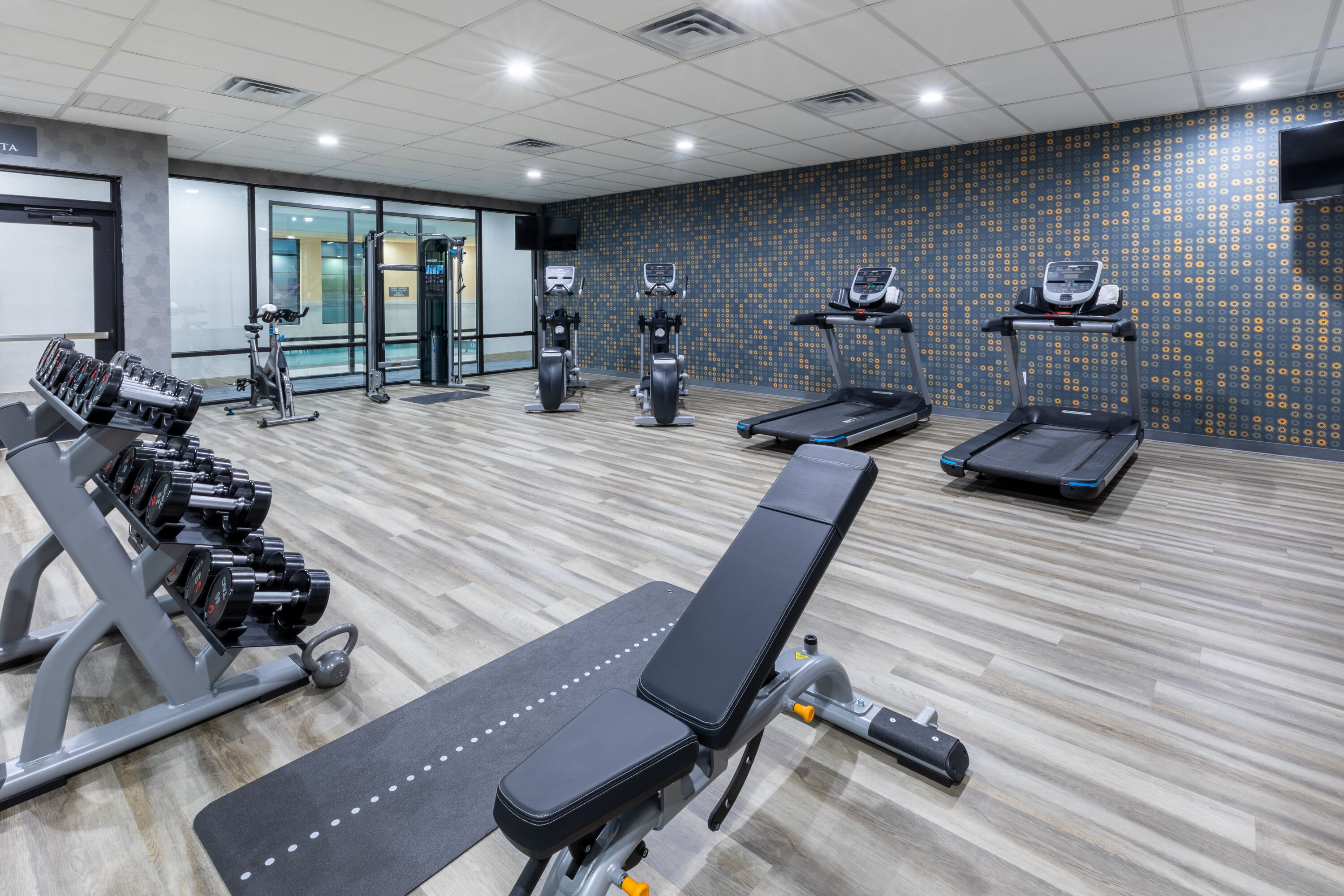 Fitness room at La Quinta Inn & Suites by Wyndham Dallas - Frisco Stadium in Frisco, Texas