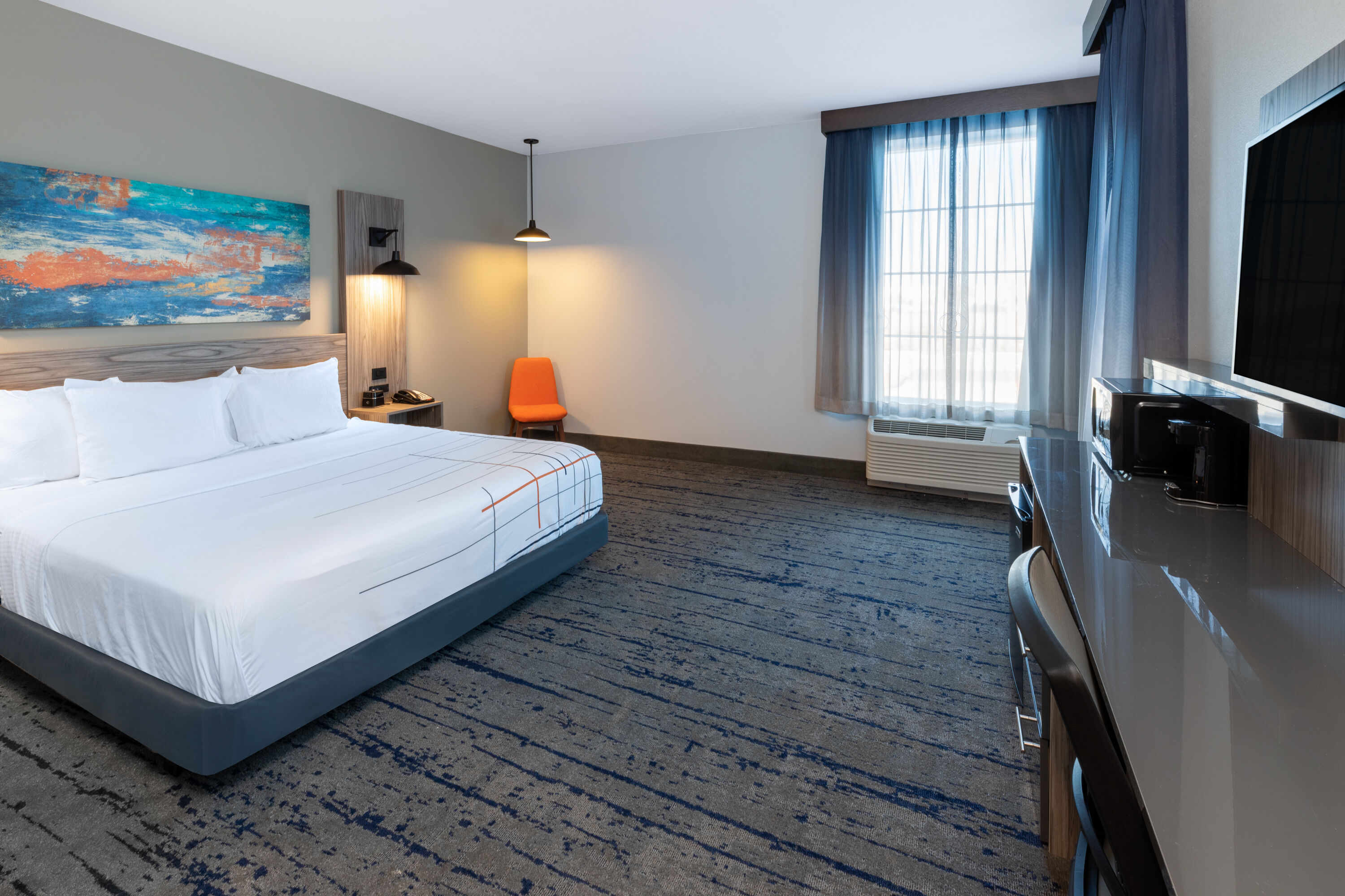 Guest room at the La Quinta Inn & Suites by Wyndham Dallas - Frisco Stadium in Frisco, Texas