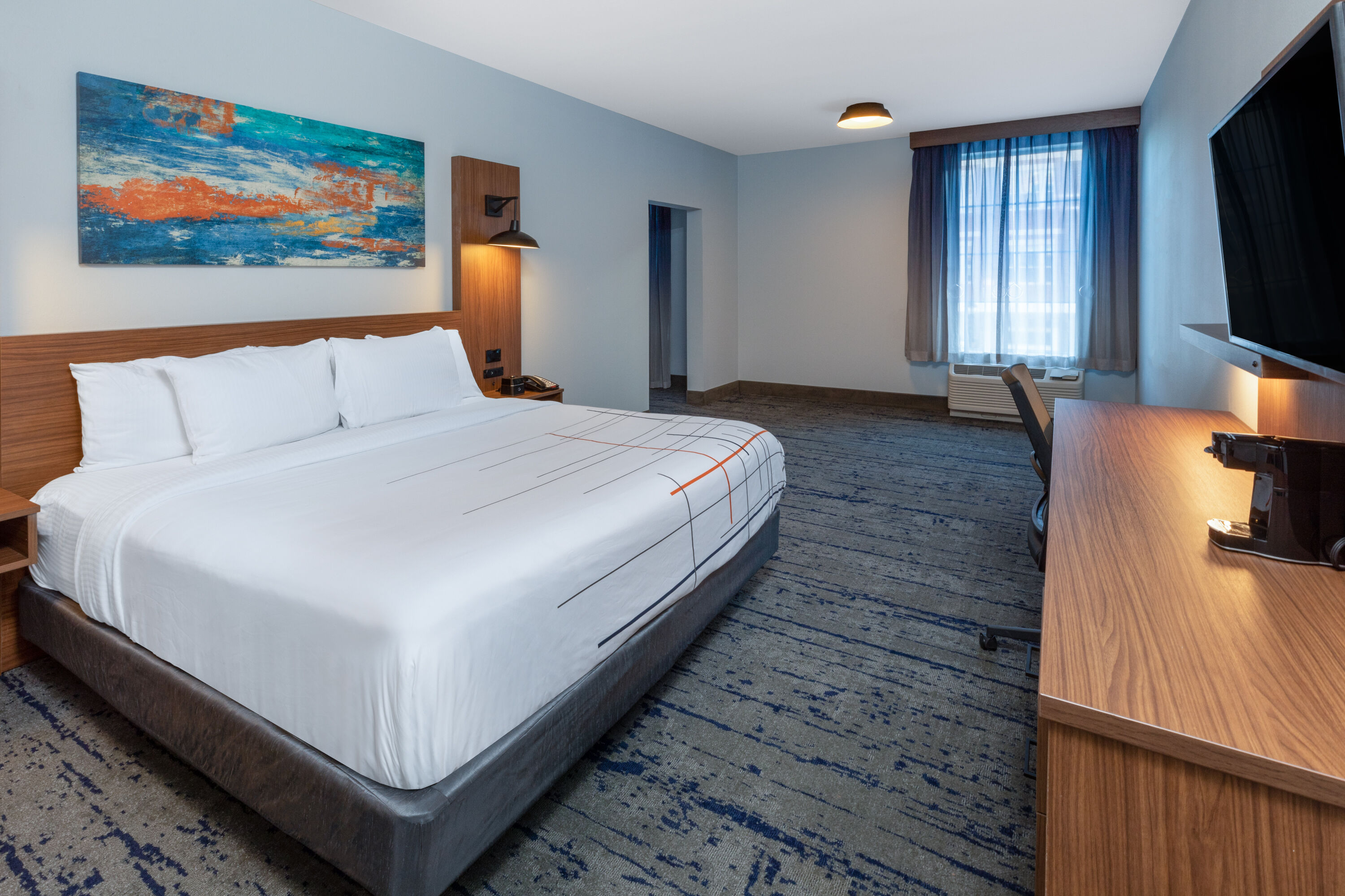 Guest room at the La Quinta Inn & Suites by Wyndham Dallas - Frisco Stadium in Frisco, Texas