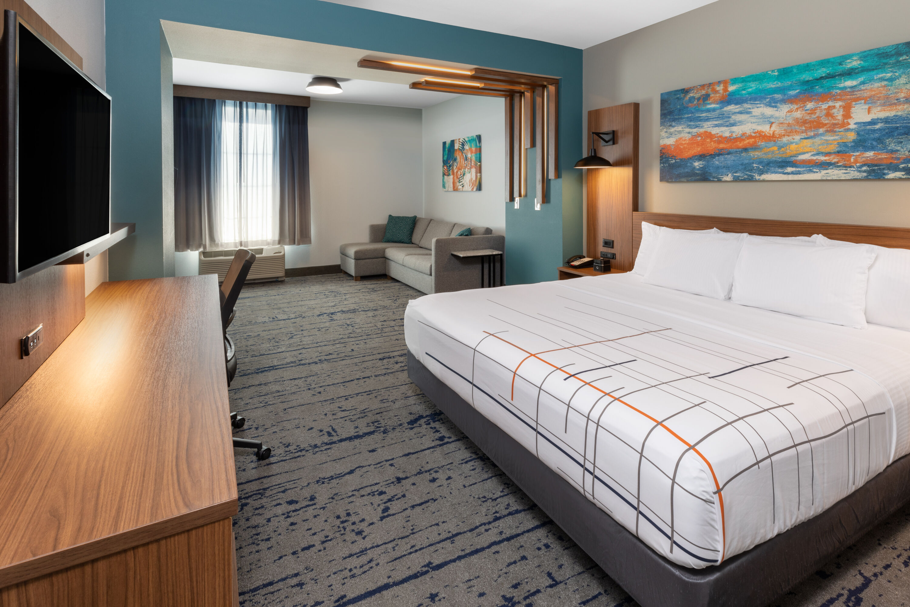 Guest room at the La Quinta Inn & Suites by Wyndham Dallas - Frisco Stadium in Frisco, Texas