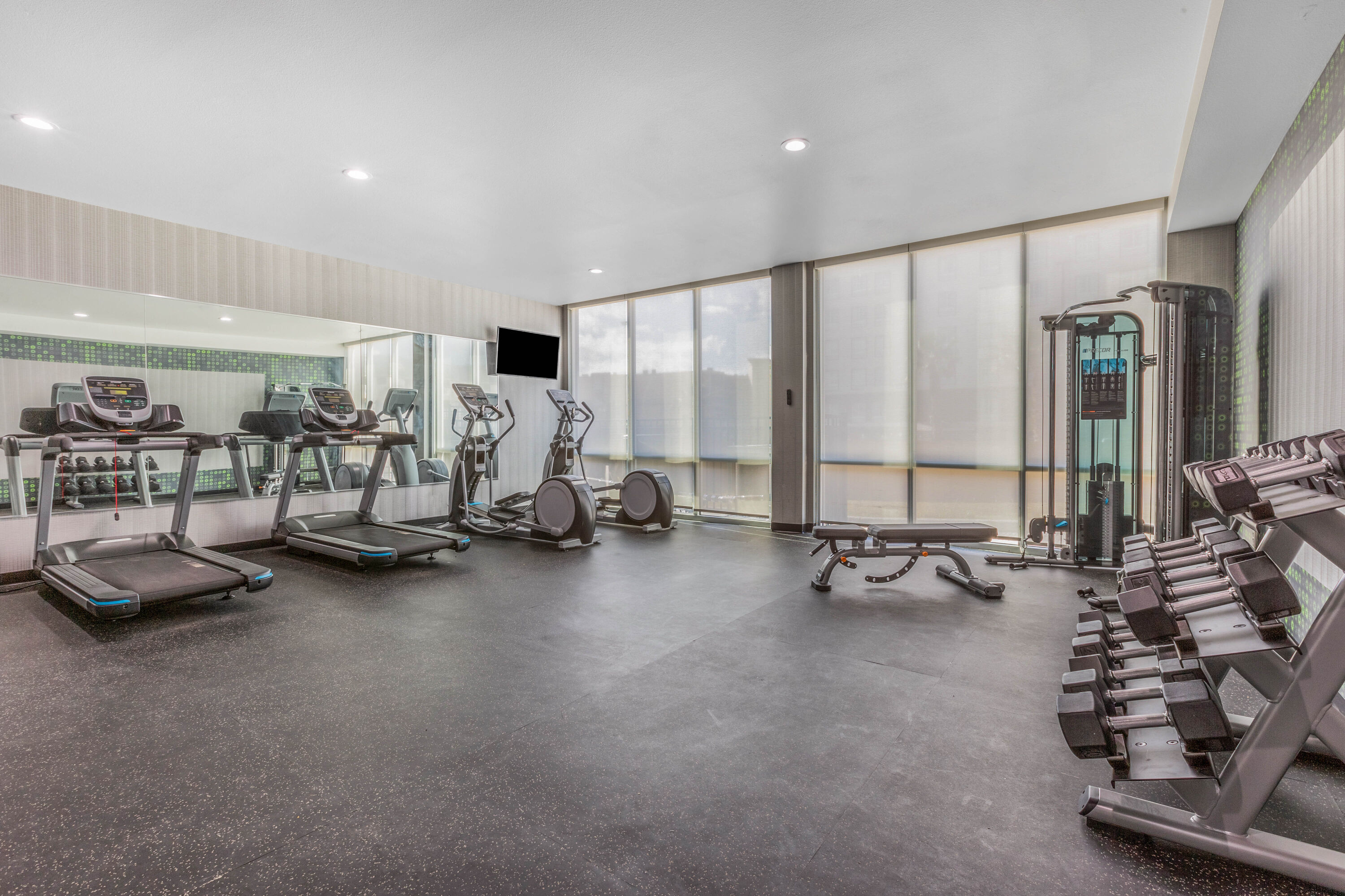 Fitness room at La Quinta Inn & Suites by Wyndham Galveston West Seawall in Galveston, Texas