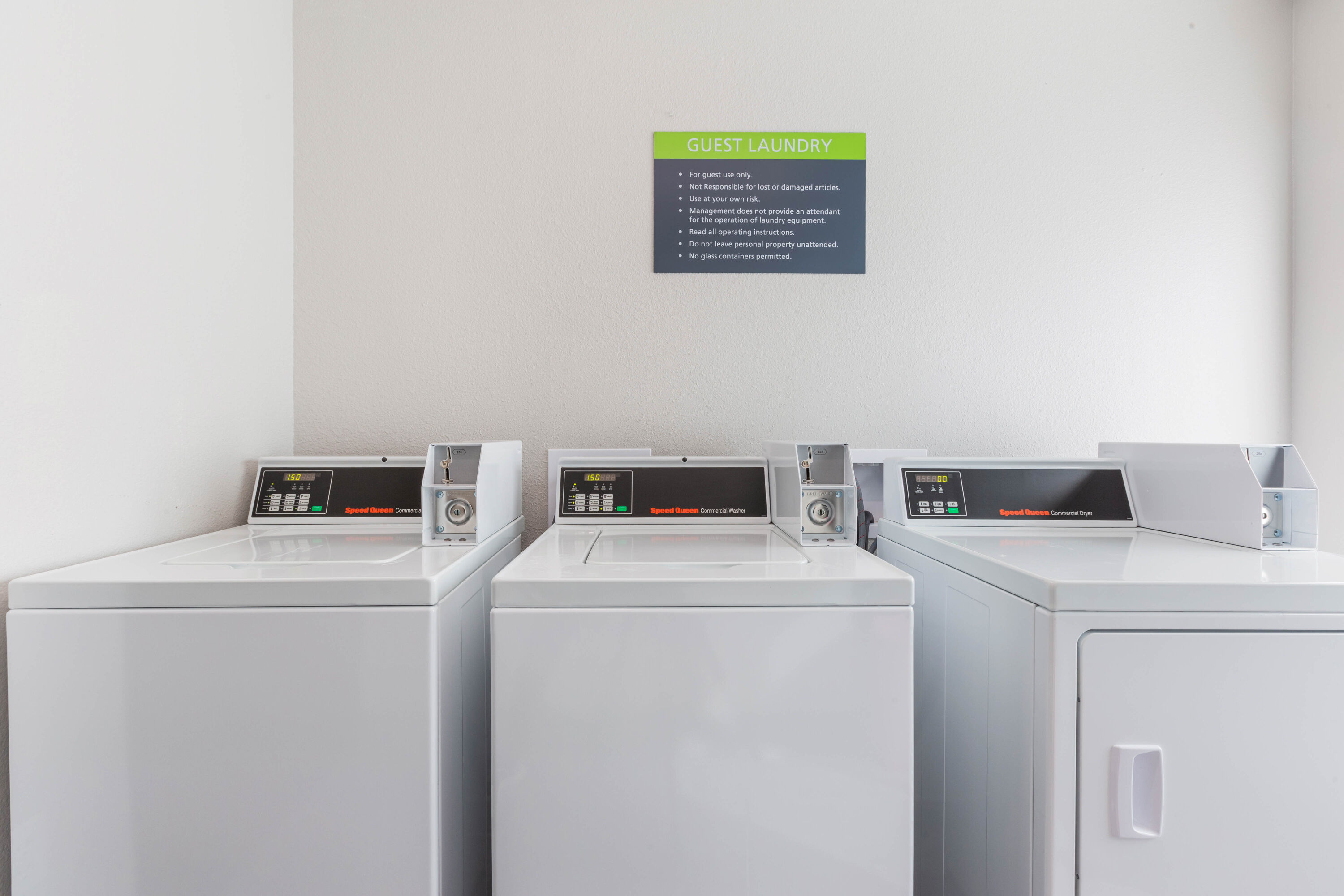 Laundry facilities at La Quinta Inn & Suites by Wyndham Galveston West Seawall in Galveston, Texas