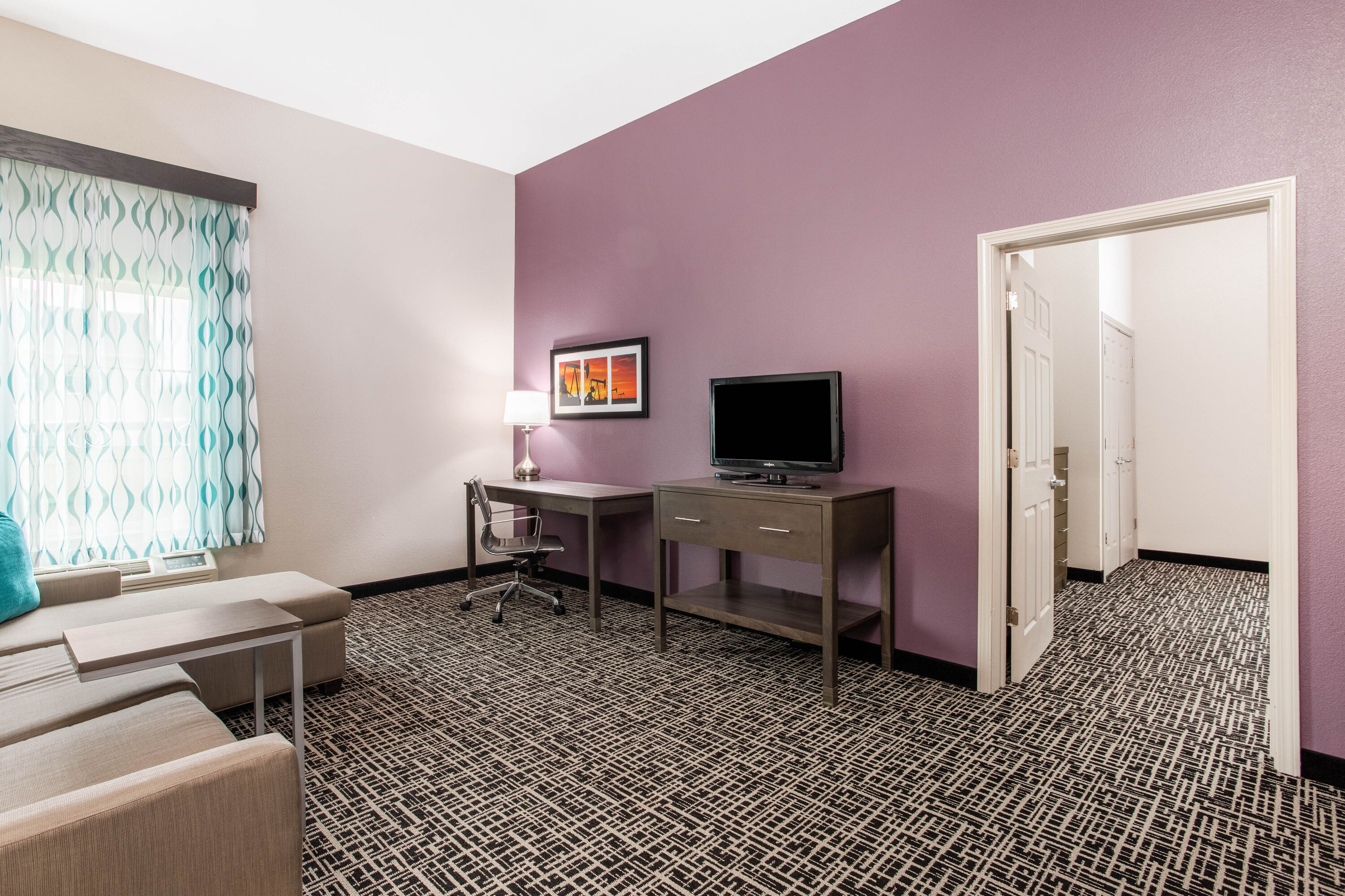 Guest room at the La Quinta Inn & Suites by Wyndham Hillsboro in Hillsboro, Texas