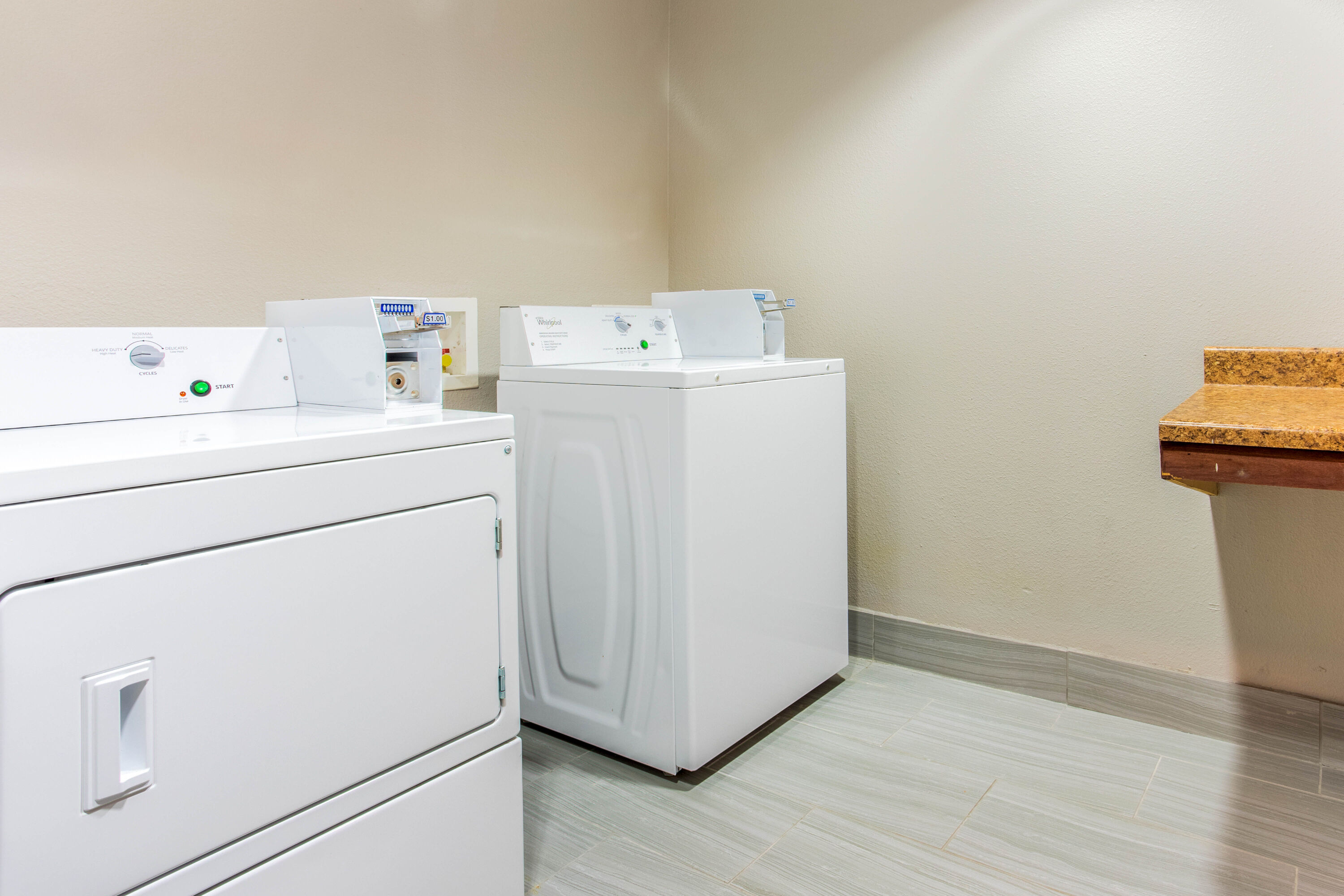 Laundry facilities at La Quinta Inn & Suites by Wyndham Hillsboro in Hillsboro, Texas