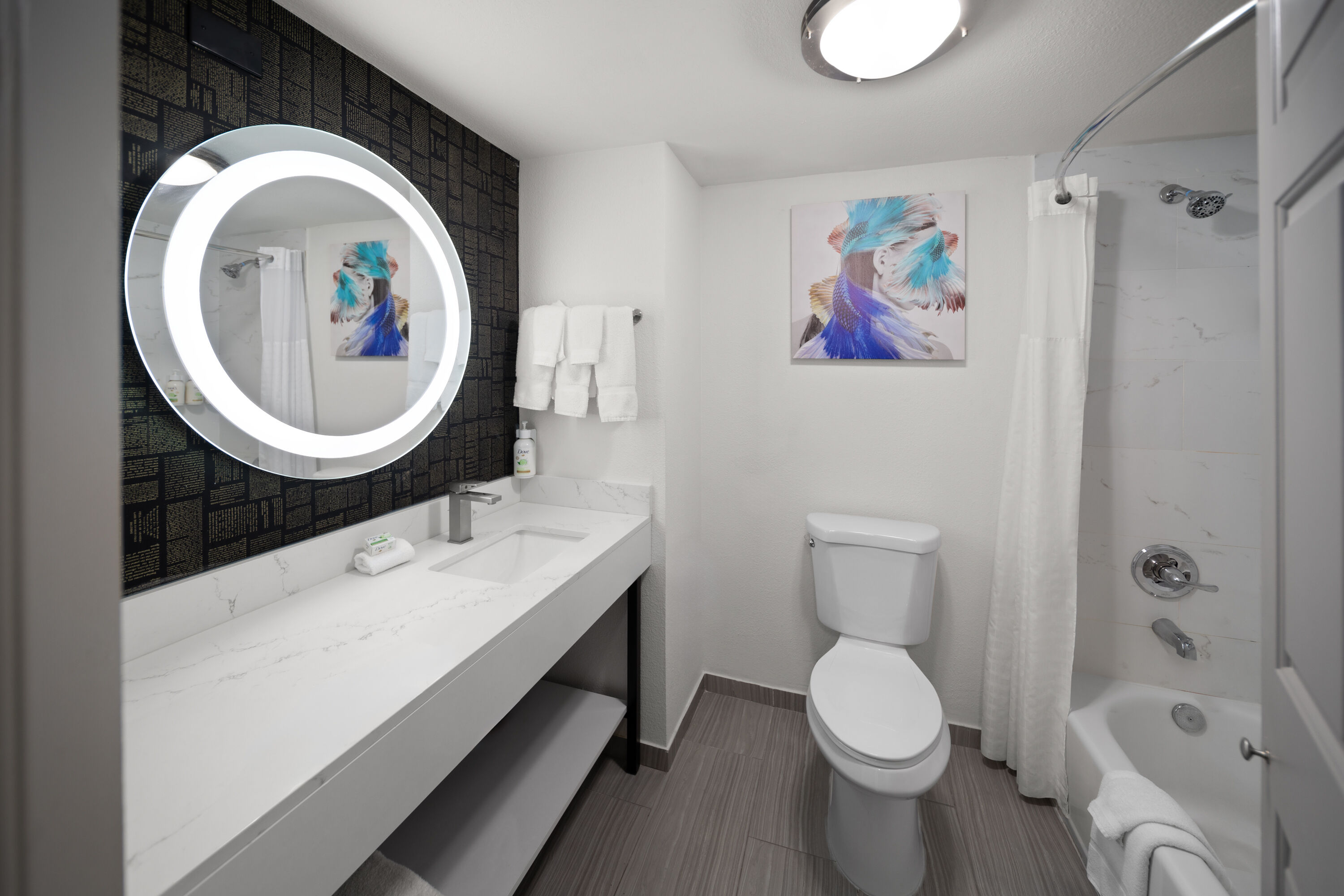 Guest room bath at the La Quinta Inn & Suites by Wyndham Houston Bush IAH South in Houston, Texas