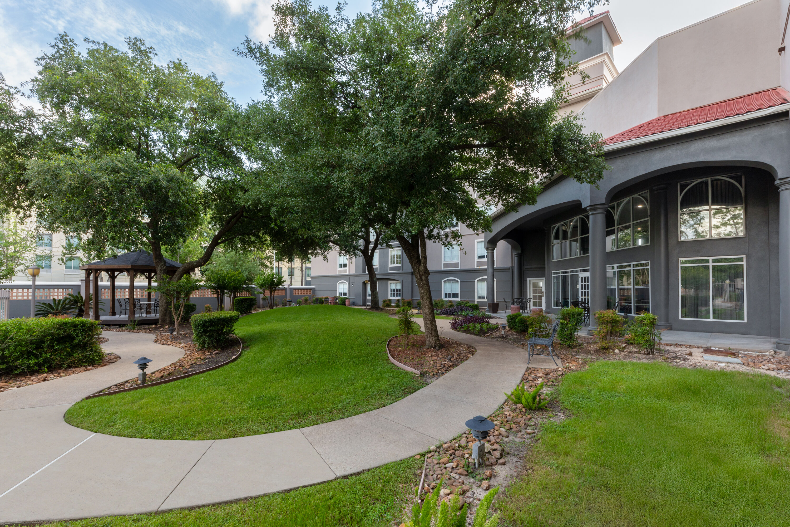 Courtyard at La Quinta Inn & Suites by Wyndham Houston Bush IAH South in Houston, Texas