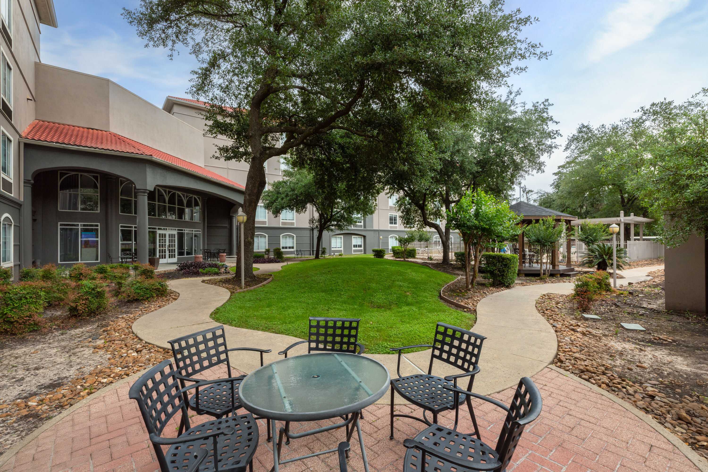 Courtyard at La Quinta Inn & Suites by Wyndham Houston Bush IAH South in Houston, Texas