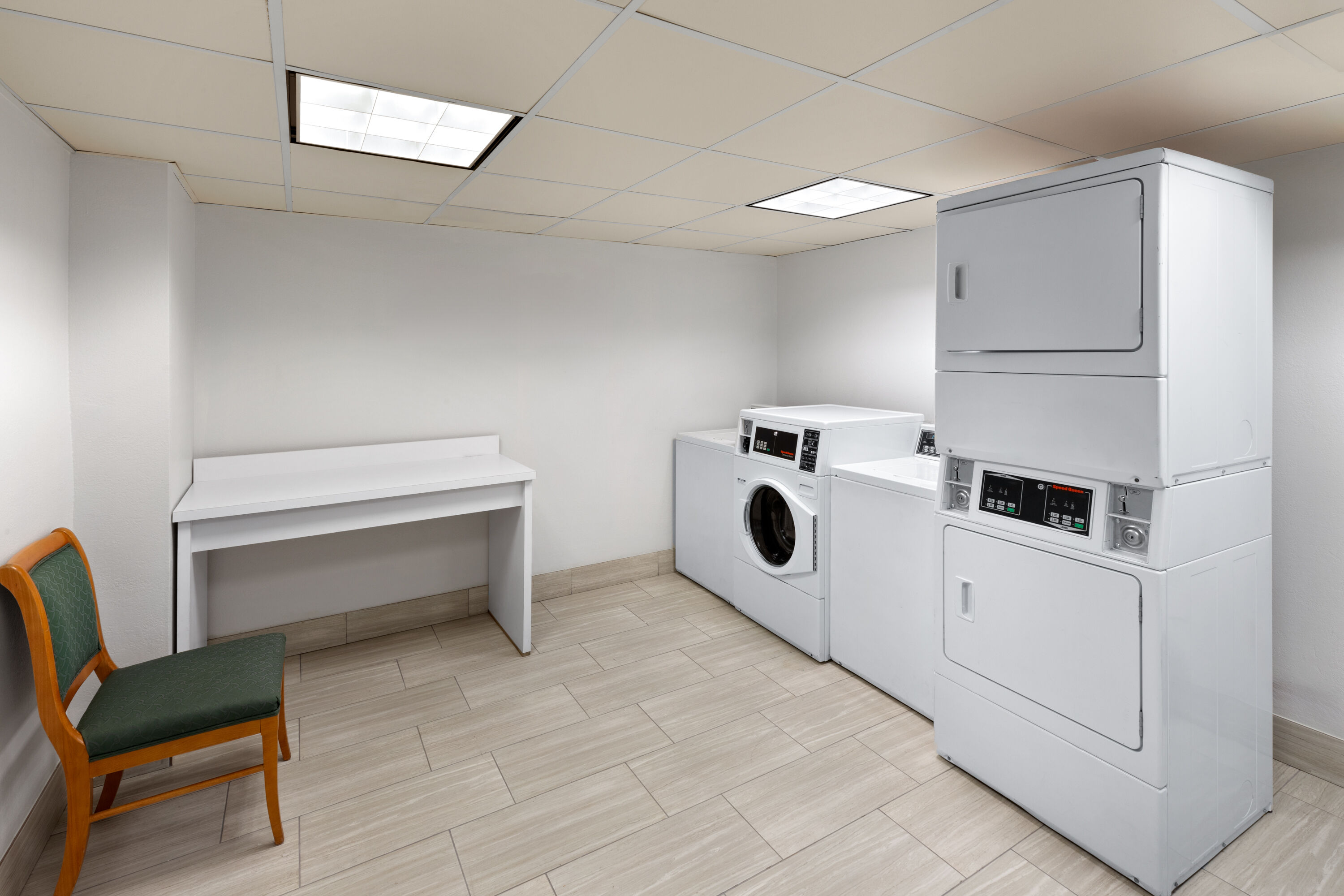 Laundry facilities at La Quinta Inn & Suites by Wyndham Houston Bush IAH South in Houston, Texas