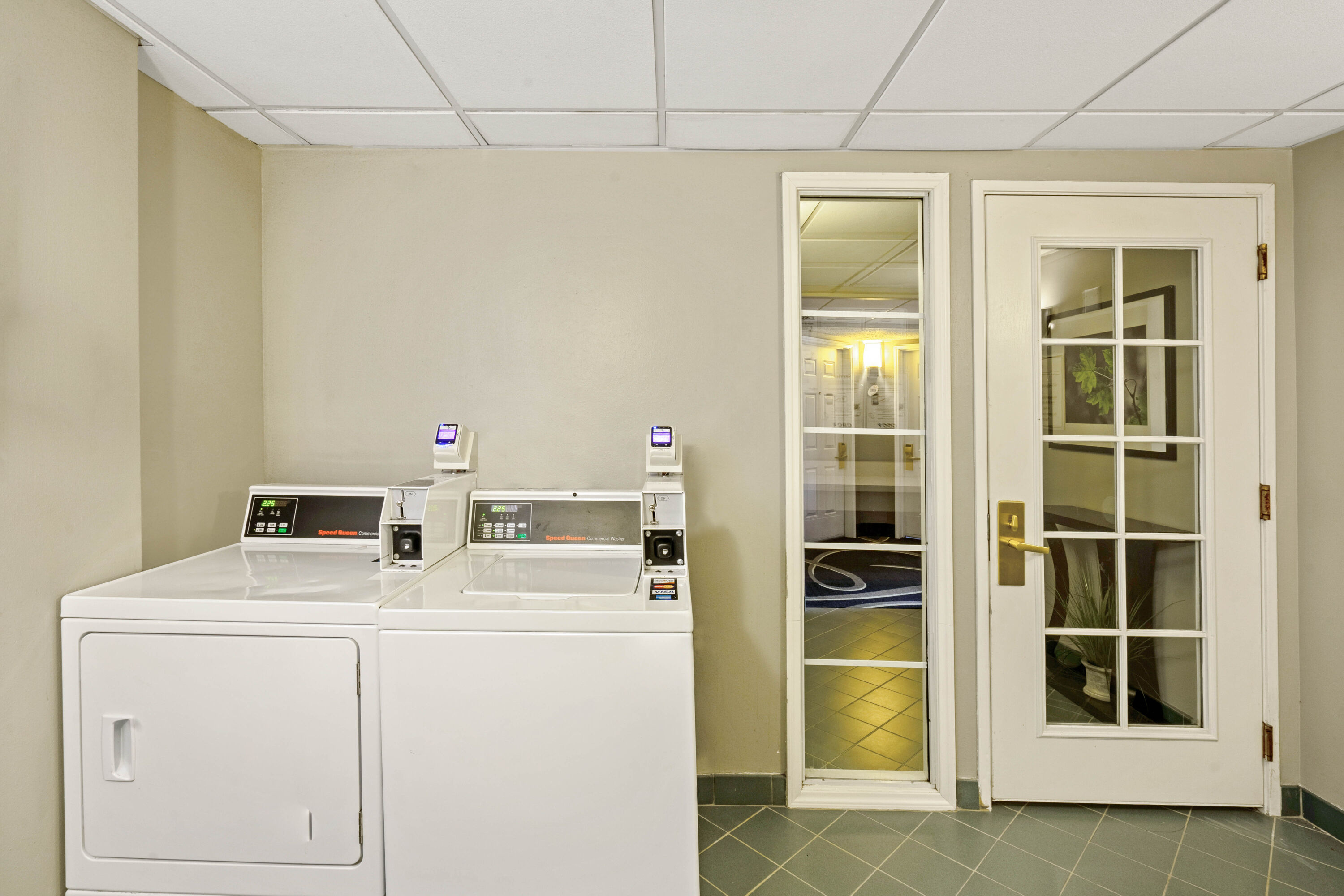 Laundry facilities at La Quinta Inn & Suites by Wyndham Houston West Park 10 in Houston, Texas