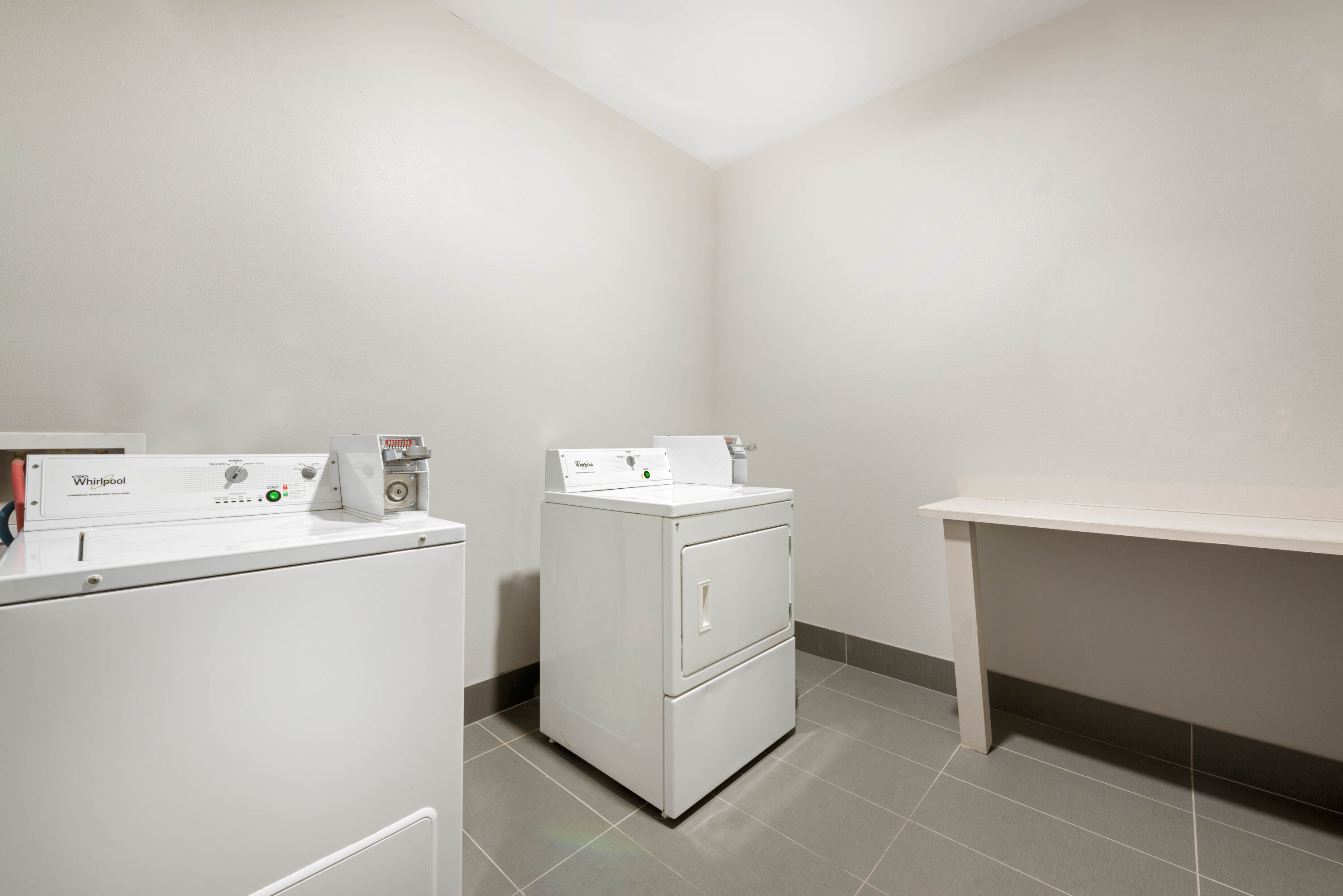 Laundry facilities at La Quinta Inn & Suites by Wyndham Houston Humble Atascocita in Humble, Texas