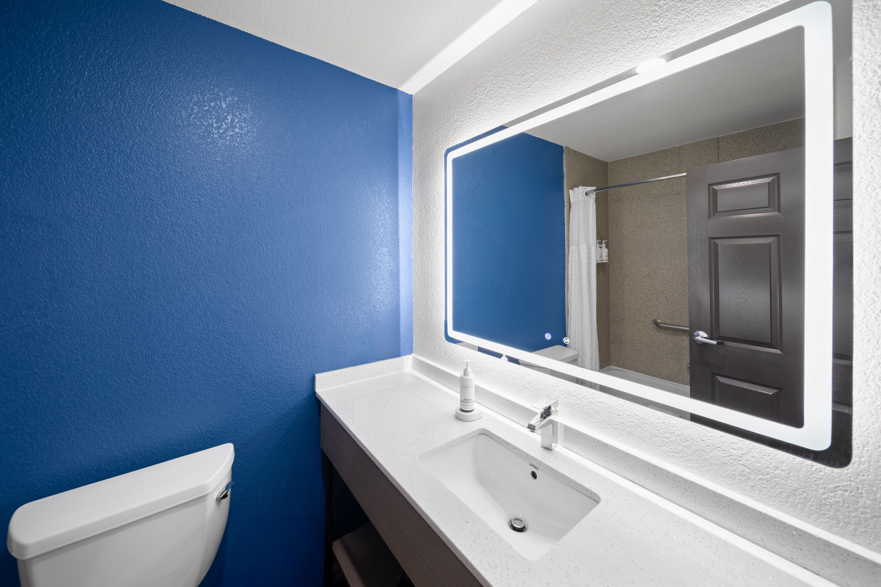 Guest room bath at the La Quinta Inn & Suites by Wyndham Kyle - Austin South in Kyle, Texas