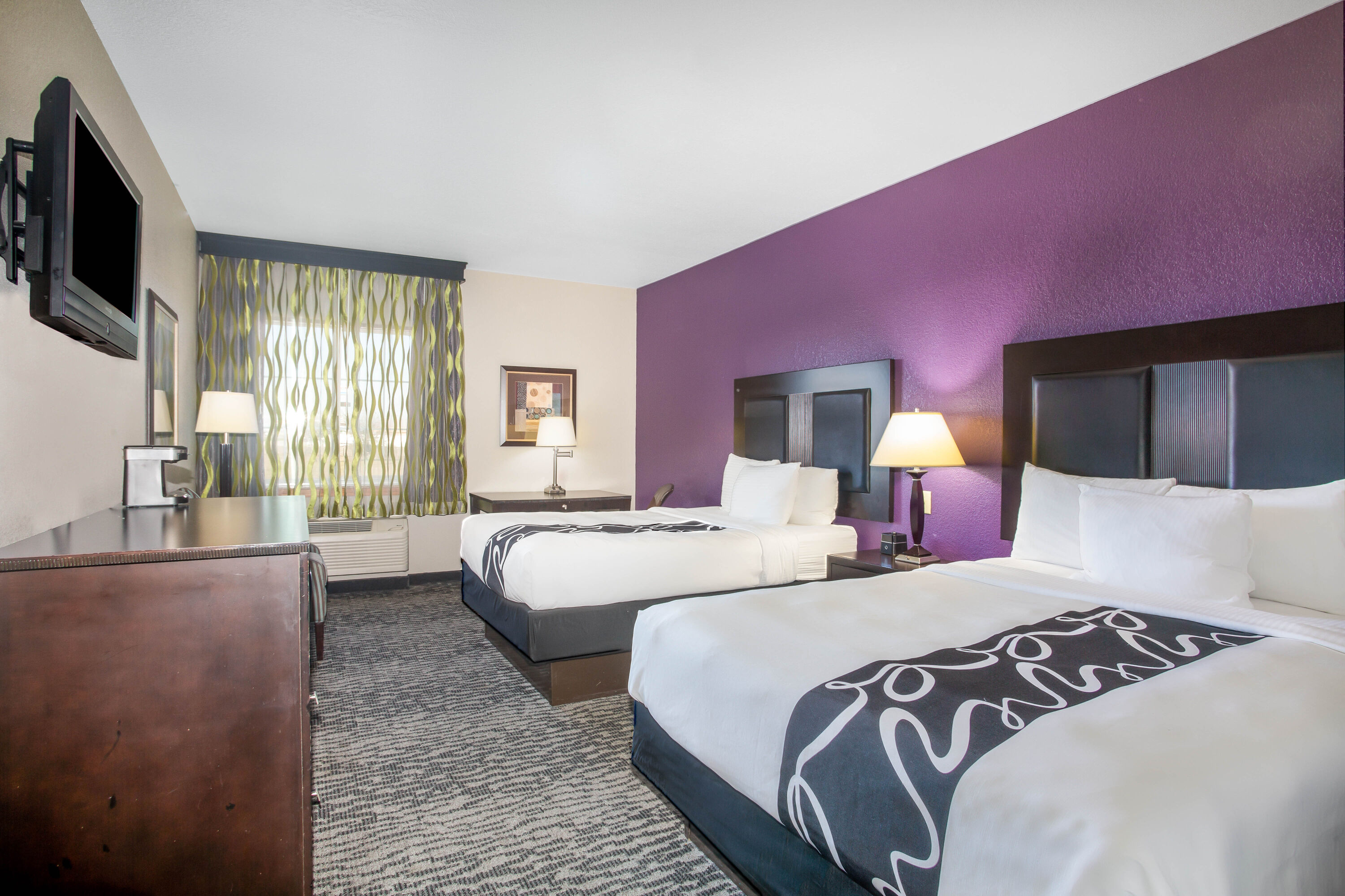 Guest room at the La Quinta Inn & Suites by Wyndham Kyle - Austin South in Kyle, Texas