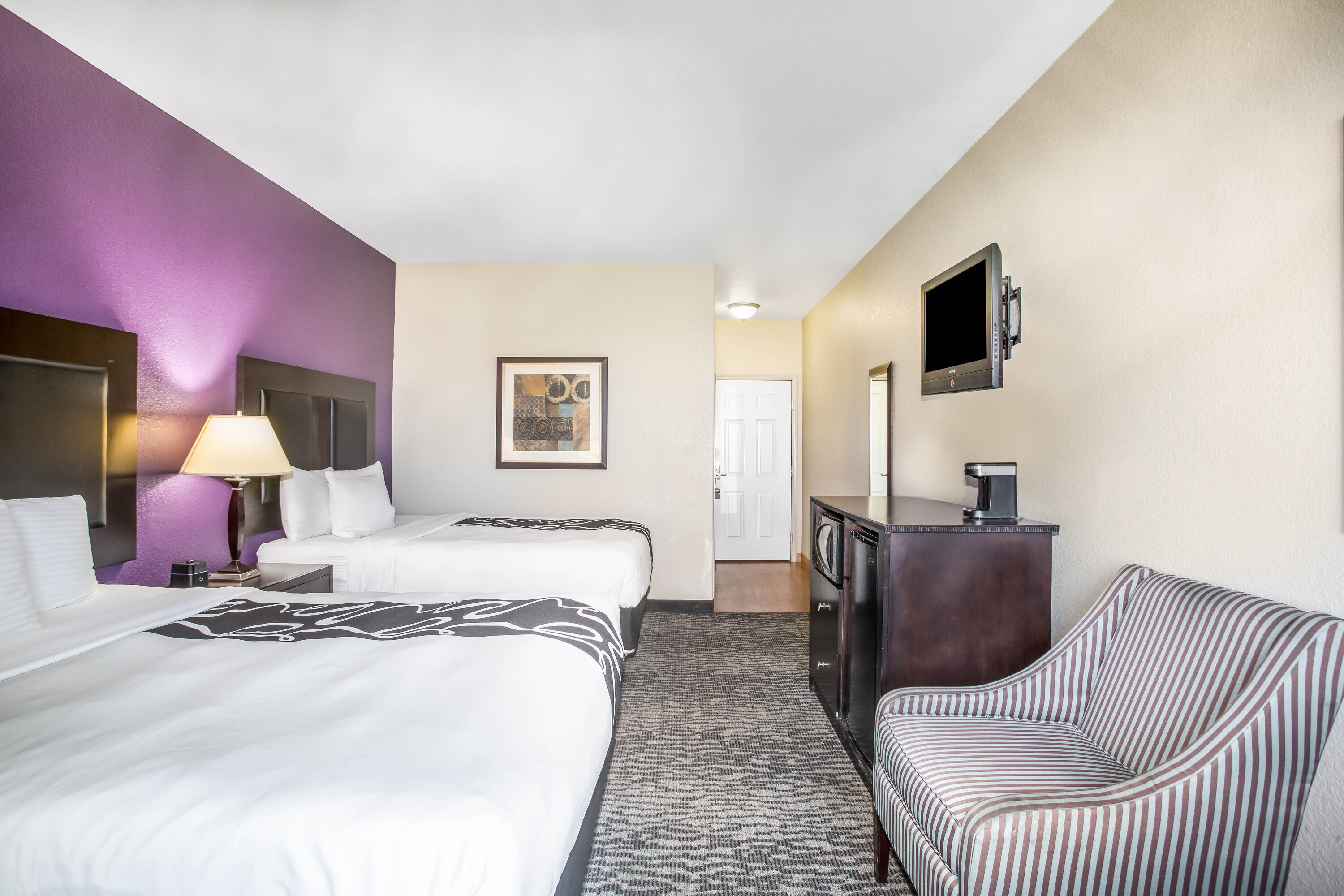 Guest room at the La Quinta Inn & Suites by Wyndham Kyle - Austin South in Kyle, Texas