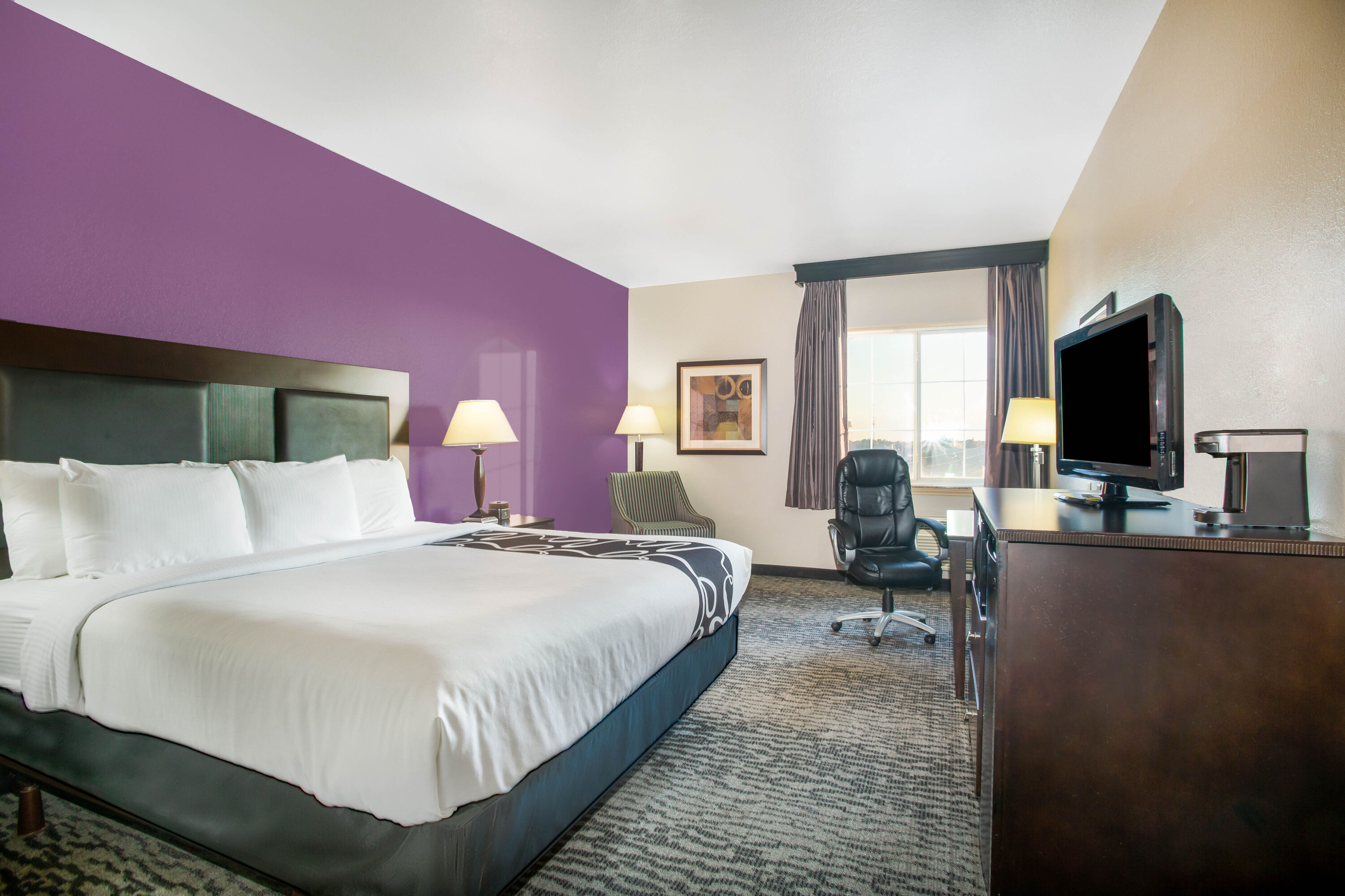 Guest room at the La Quinta Inn & Suites by Wyndham Kyle - Austin South in Kyle, Texas