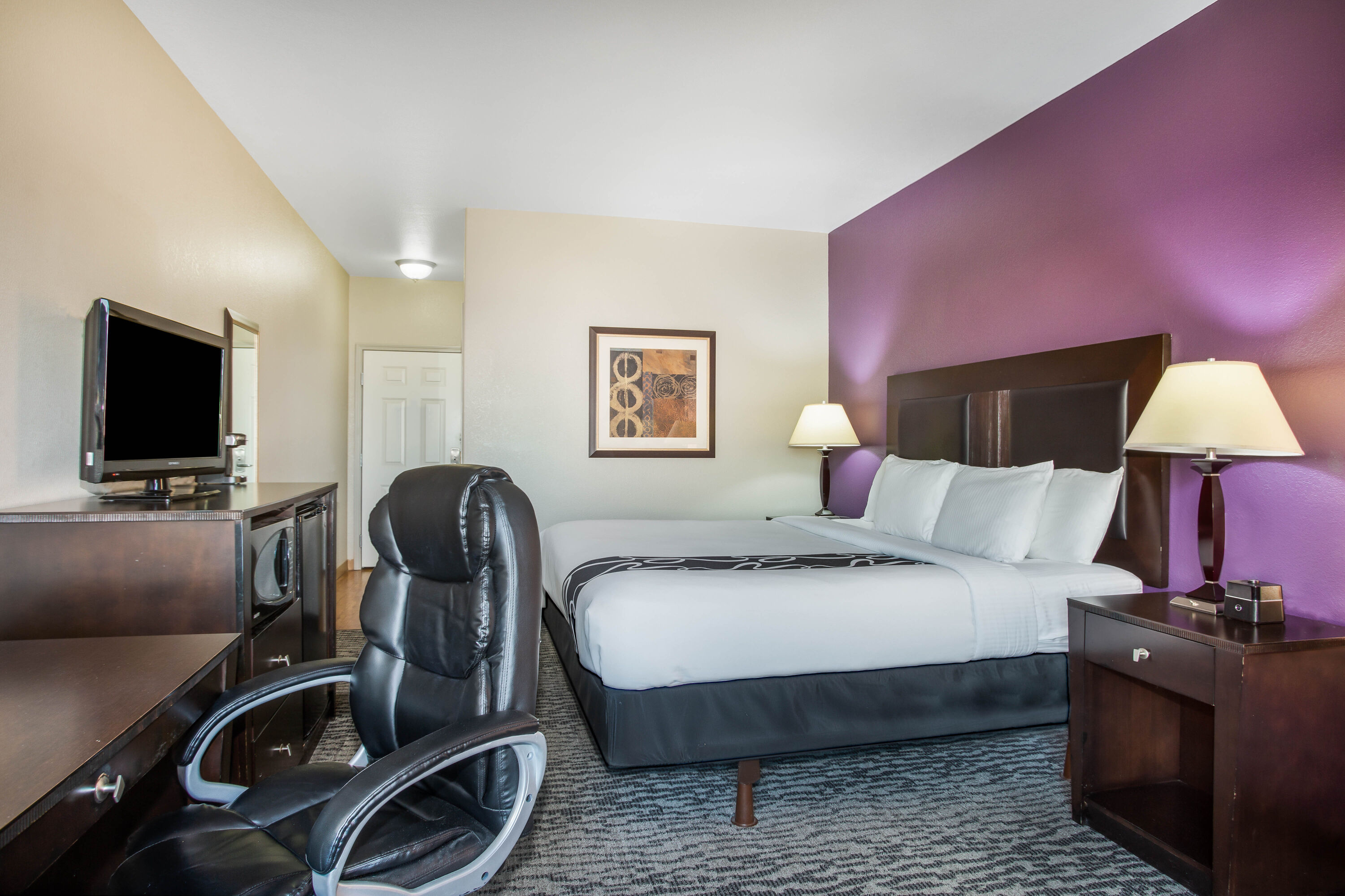 Guest room at the La Quinta Inn & Suites by Wyndham Kyle - Austin South in Kyle, Texas