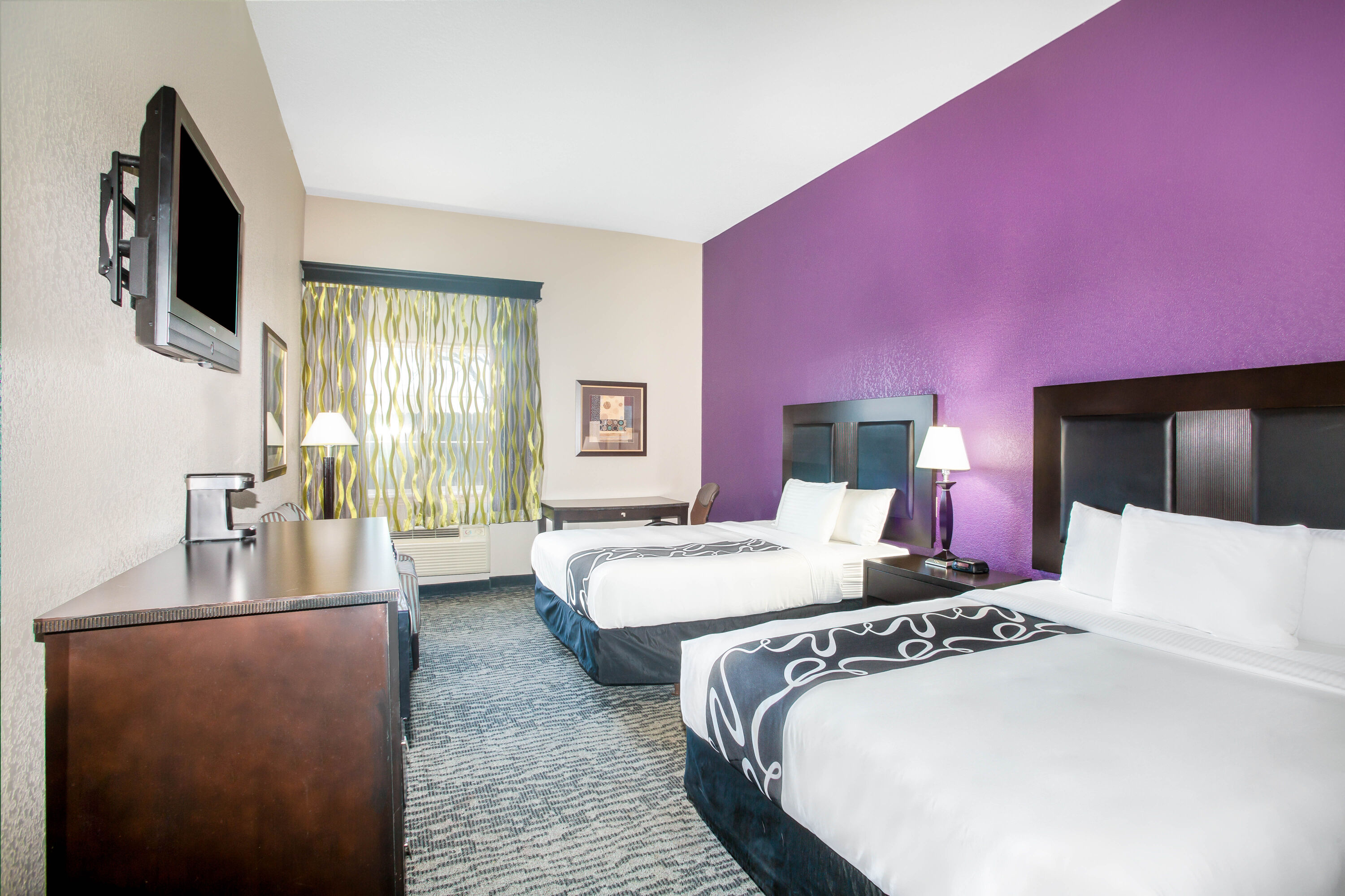 Guest room at the La Quinta Inn & Suites by Wyndham Kyle - Austin South in Kyle, Texas