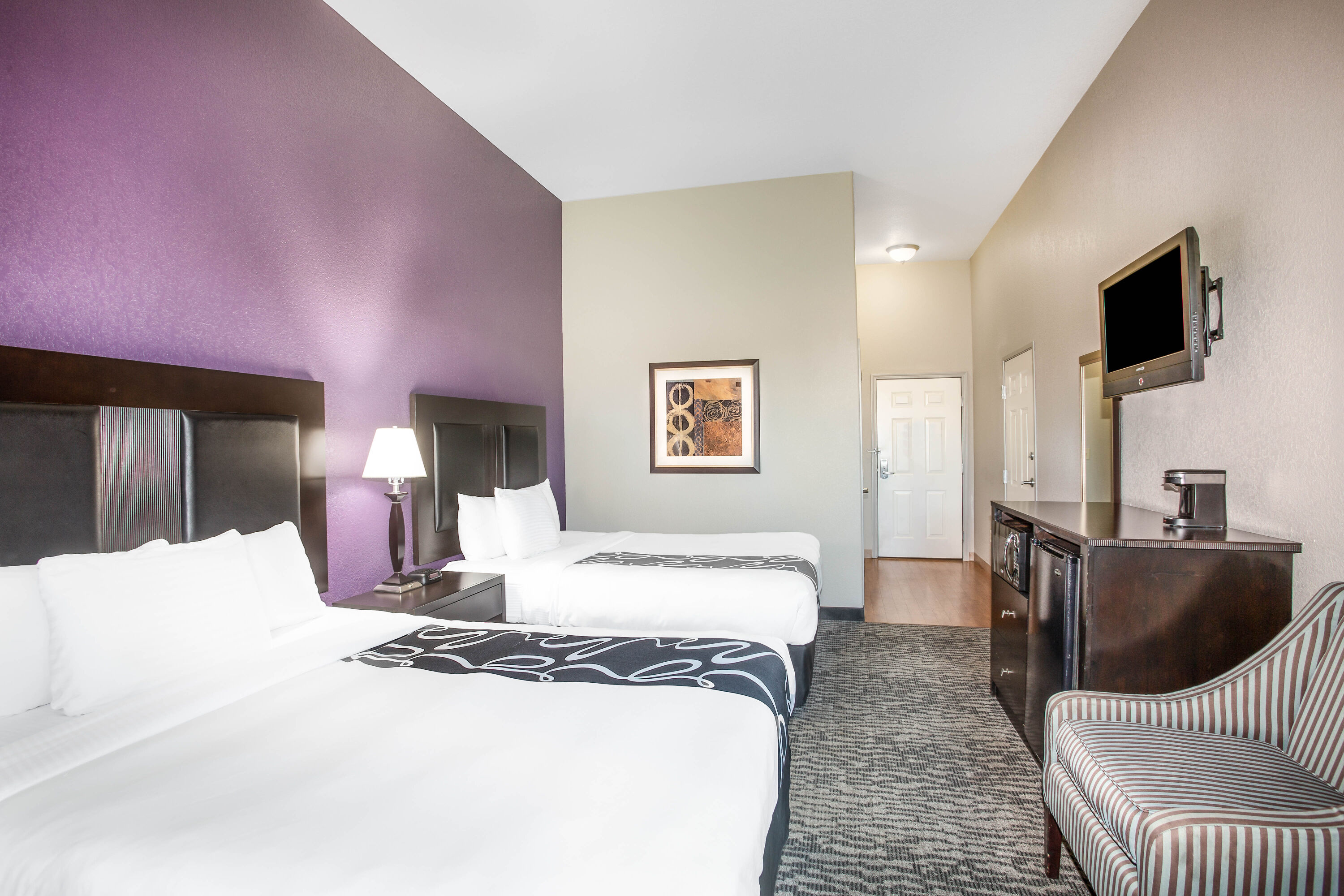 Guest room at the La Quinta Inn & Suites by Wyndham Kyle - Austin South in Kyle, Texas