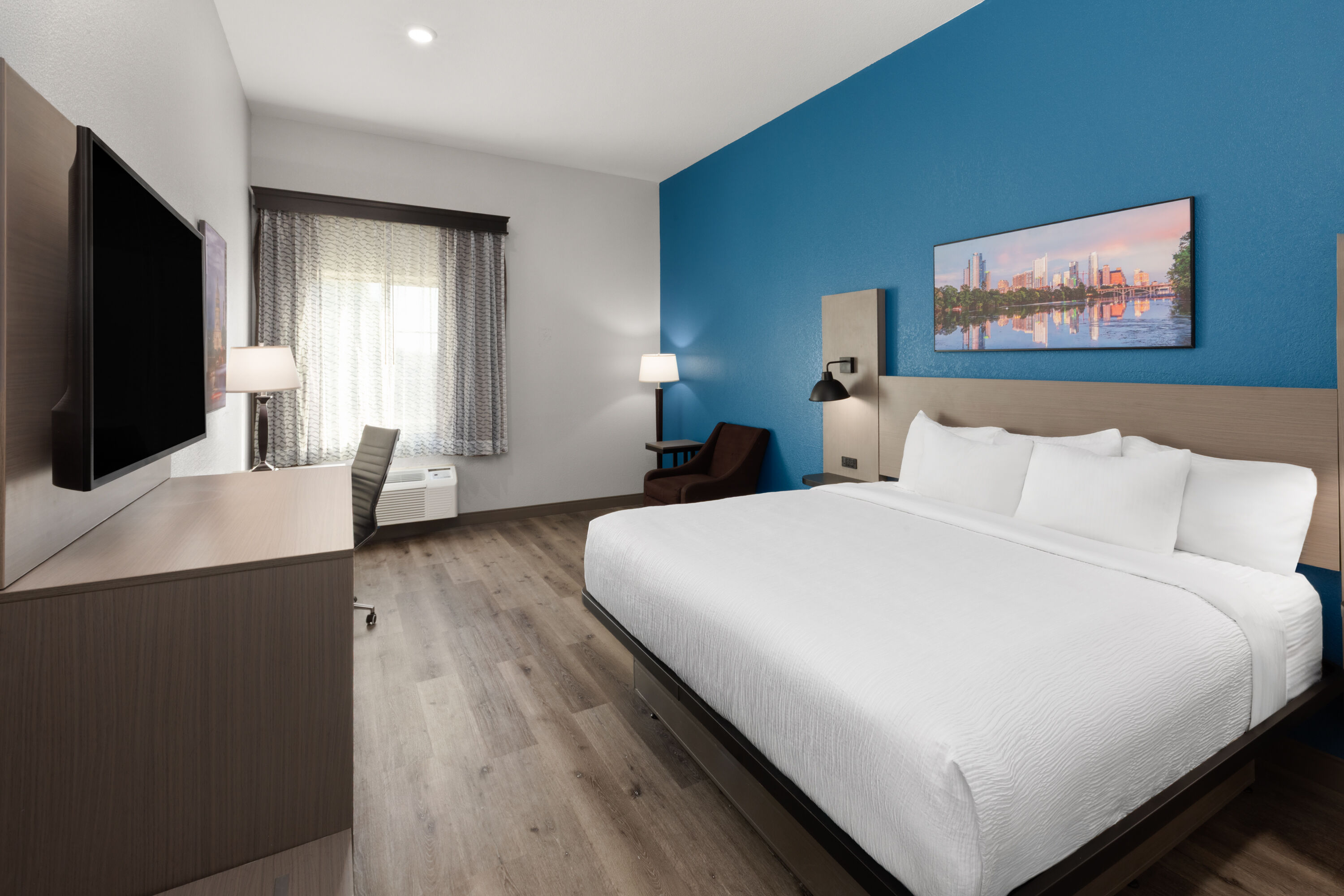 Guest room at the La Quinta Inn & Suites by Wyndham Kyle - Austin South in Kyle, Texas