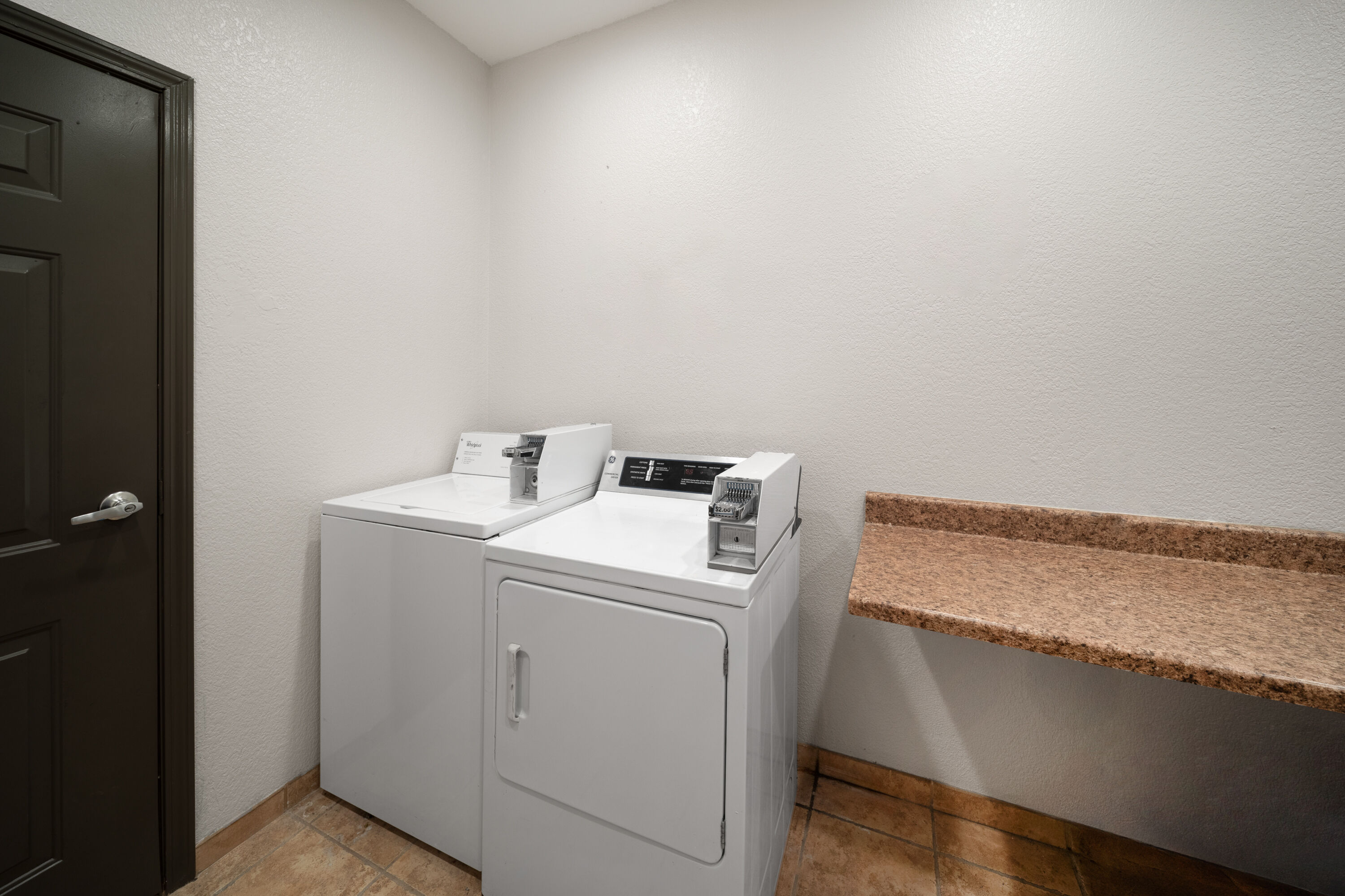 Laundry facilities at La Quinta Inn & Suites by Wyndham Kyle - Austin South in Kyle, Texas