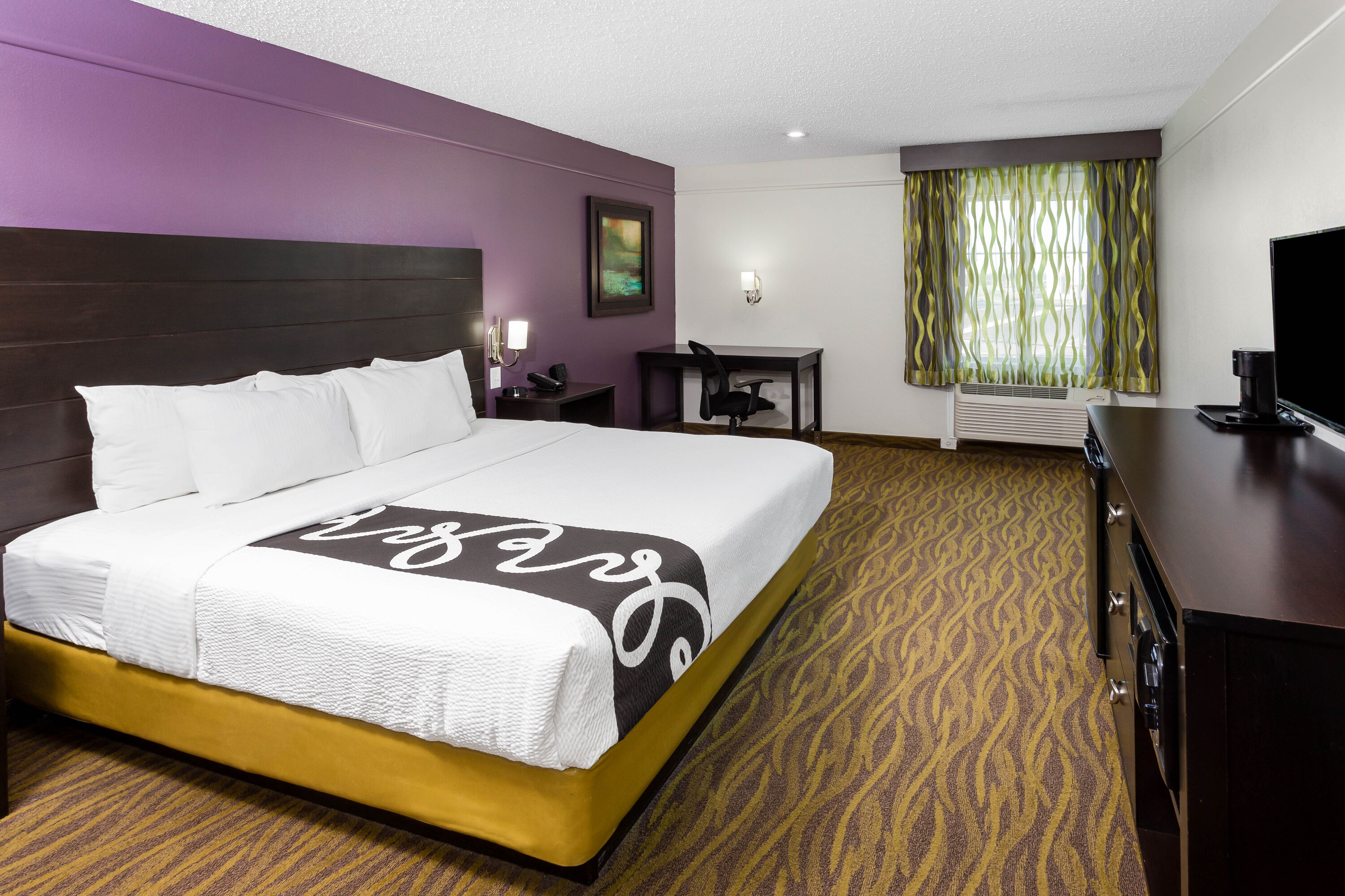 Guest room at the La Quinta Inn & Suites by Wyndham Laredo Airport in Laredo, Texas