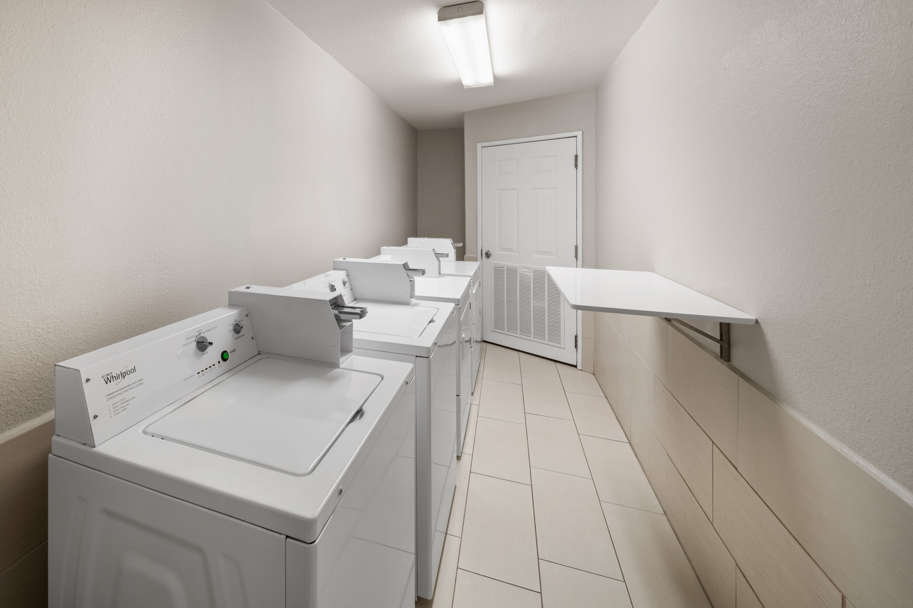 Laundry facilities at La Quinta Inn & Suites by Wyndham Laredo Airport in Laredo, Texas