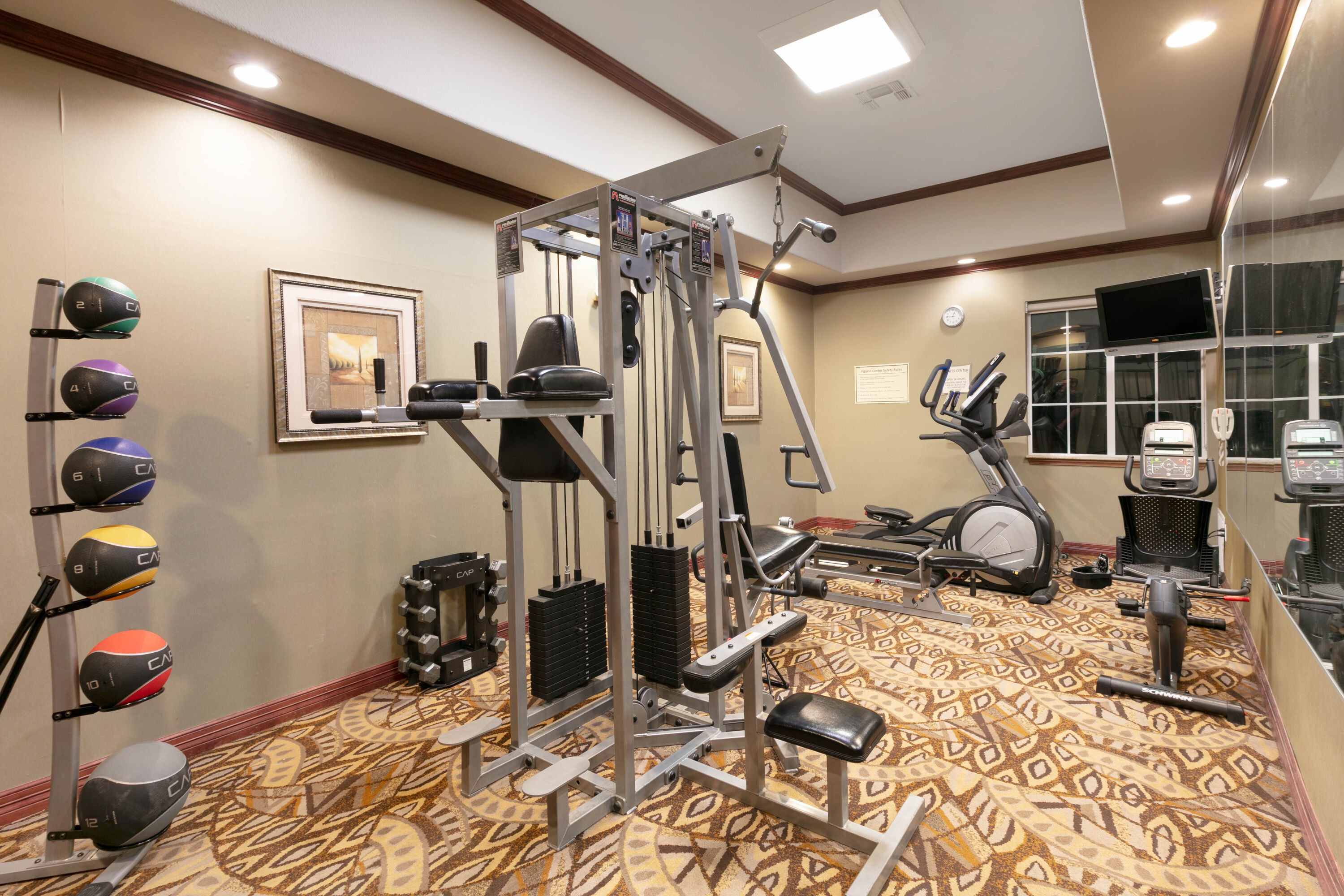 Fitness room at La Quinta Inn & Suites by Wyndham Lindale in Lindale, Texas