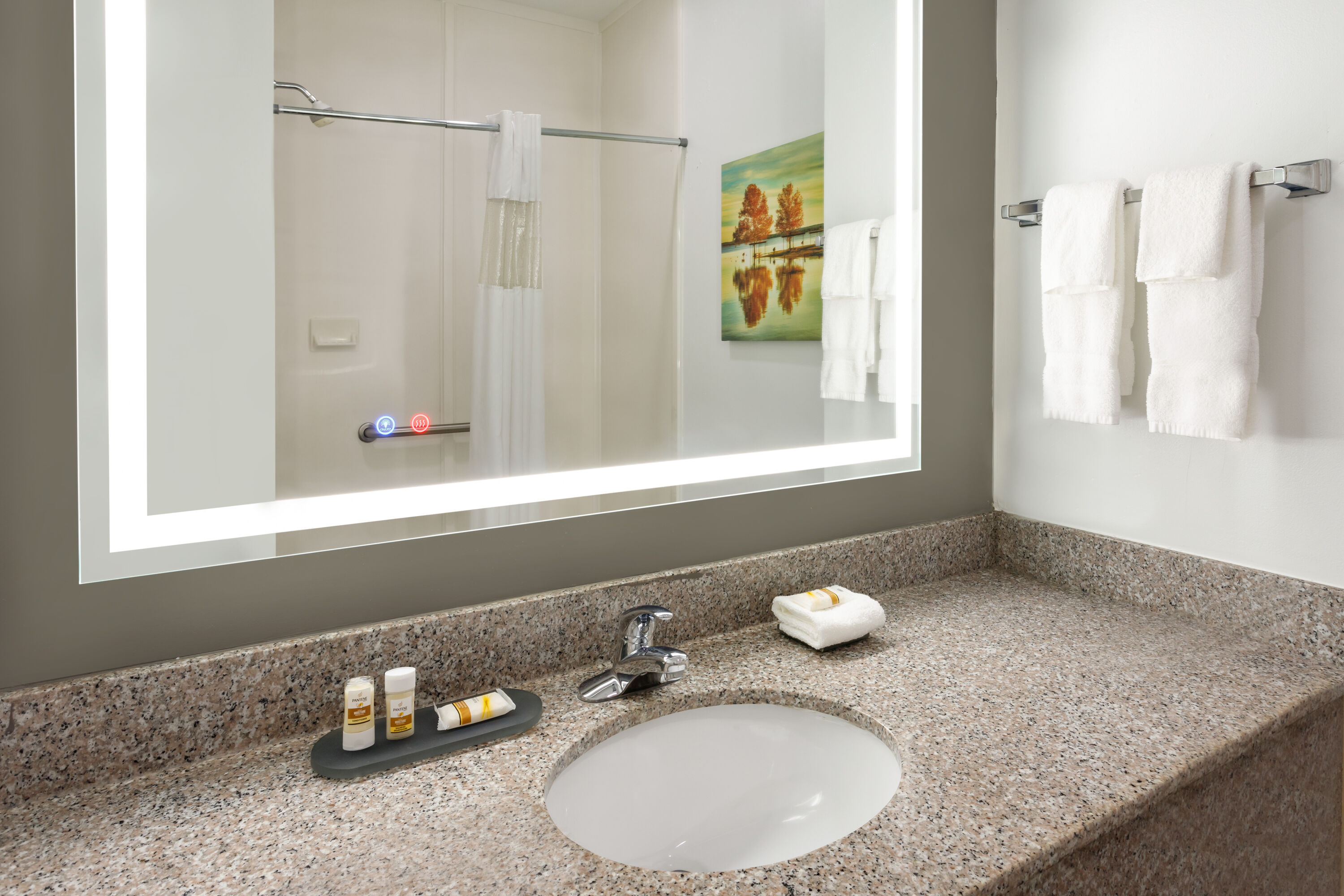 Guest room bath at the La Quinta Inn & Suites by Wyndham I-20 Longview South in Longview, Texas