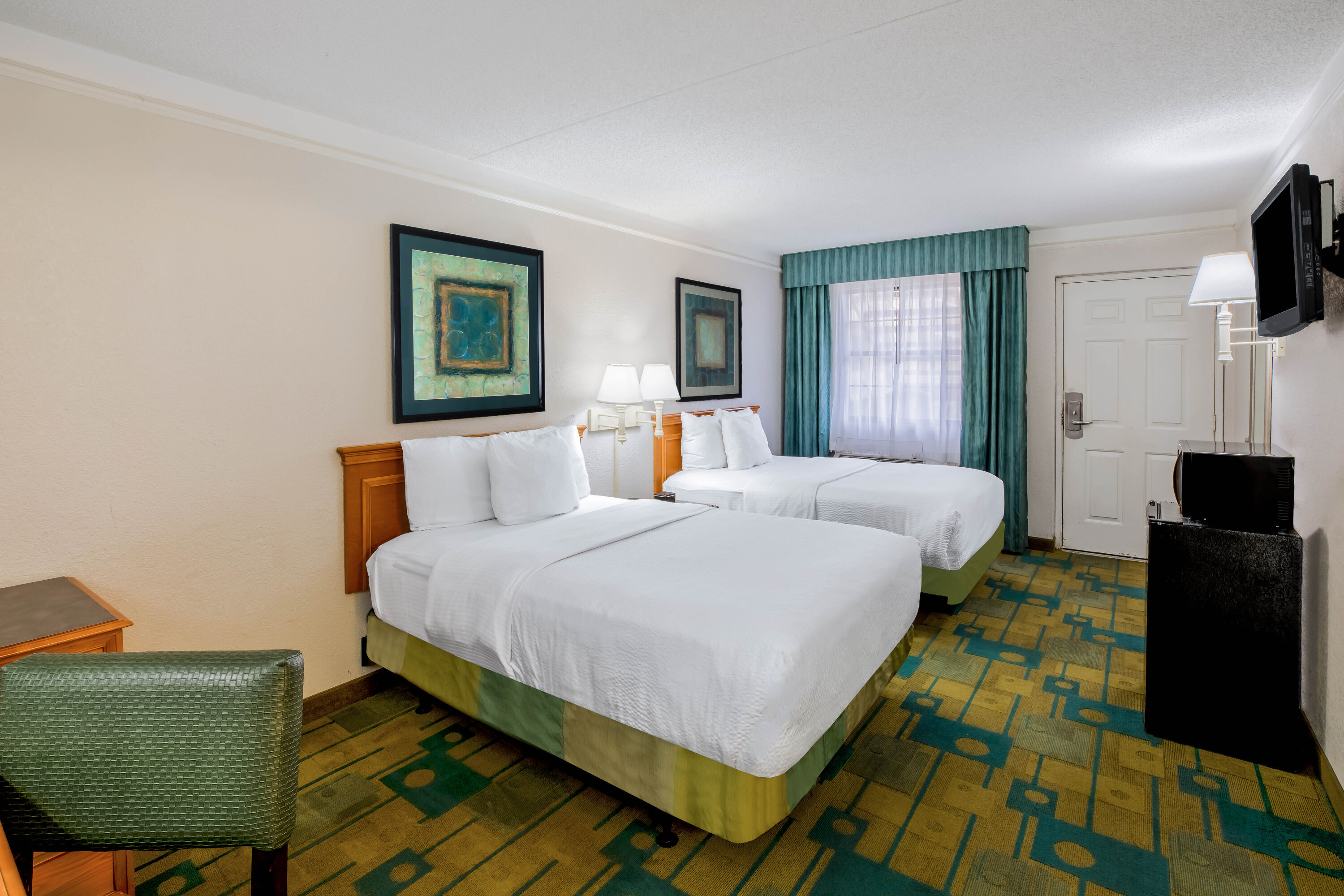 Guest room at the La Quinta Inn by Wyndham Lufkin in Lufkin, Texas