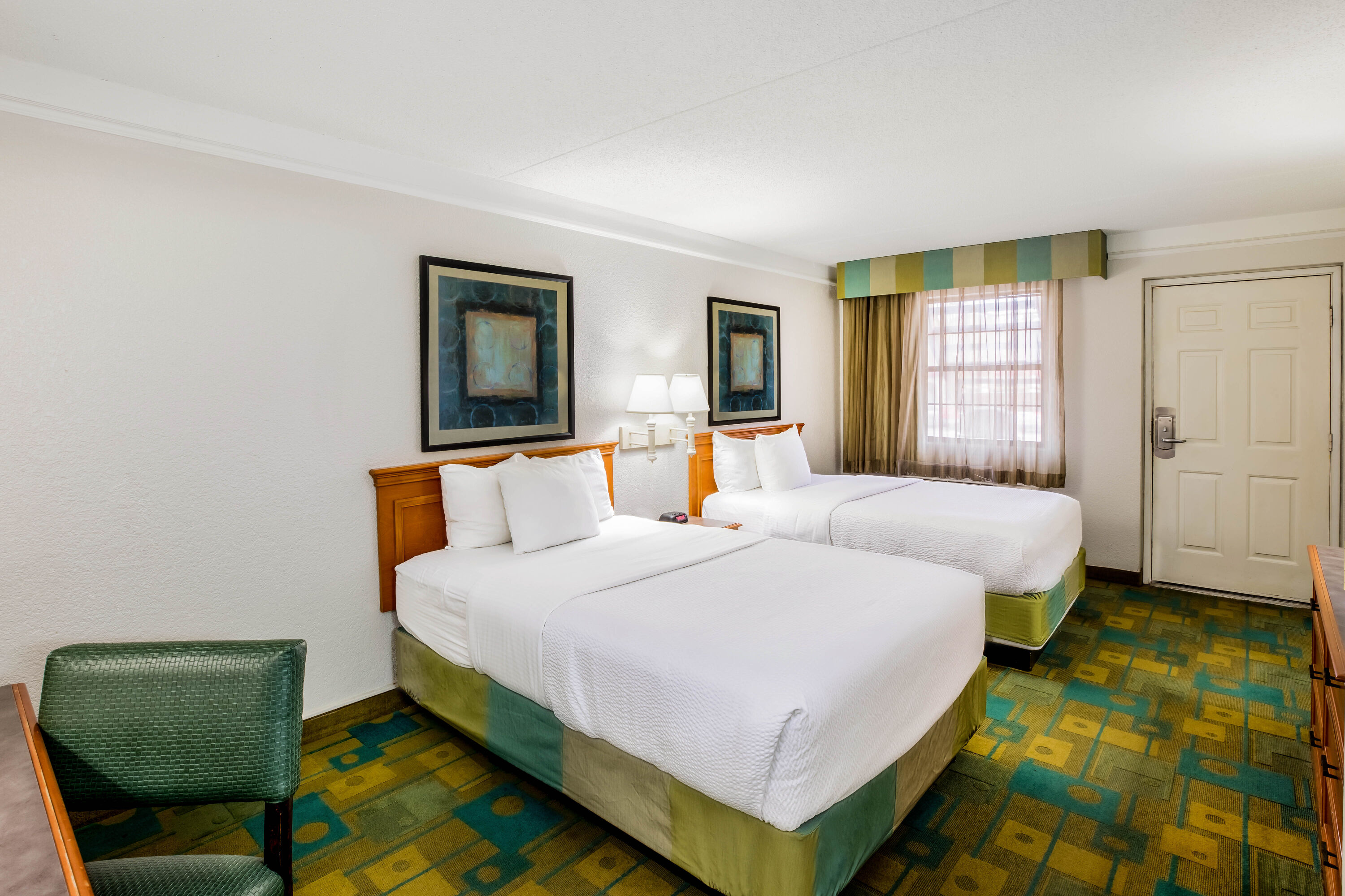 Guest room at the La Quinta Inn by Wyndham Lufkin in Lufkin, Texas