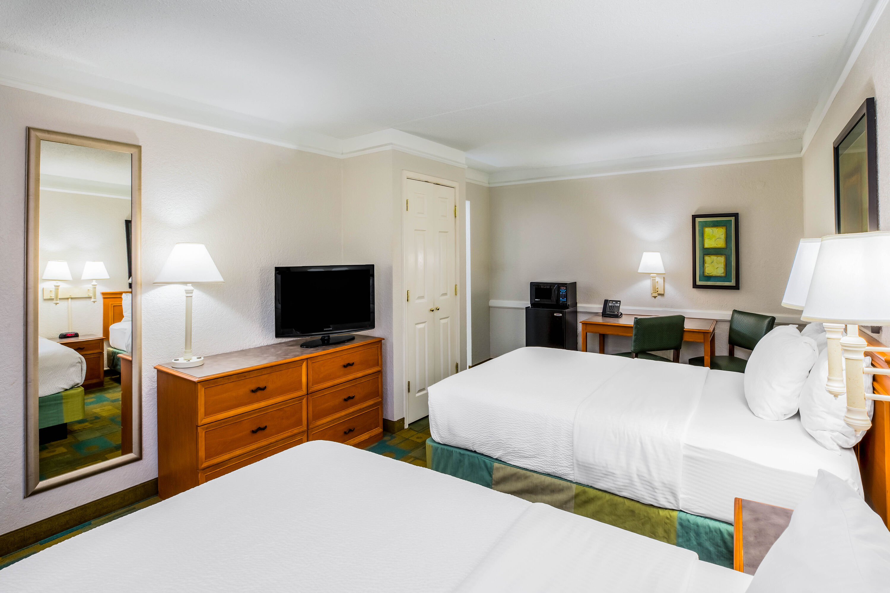 Guest room at the La Quinta Inn by Wyndham Lufkin in Lufkin, Texas