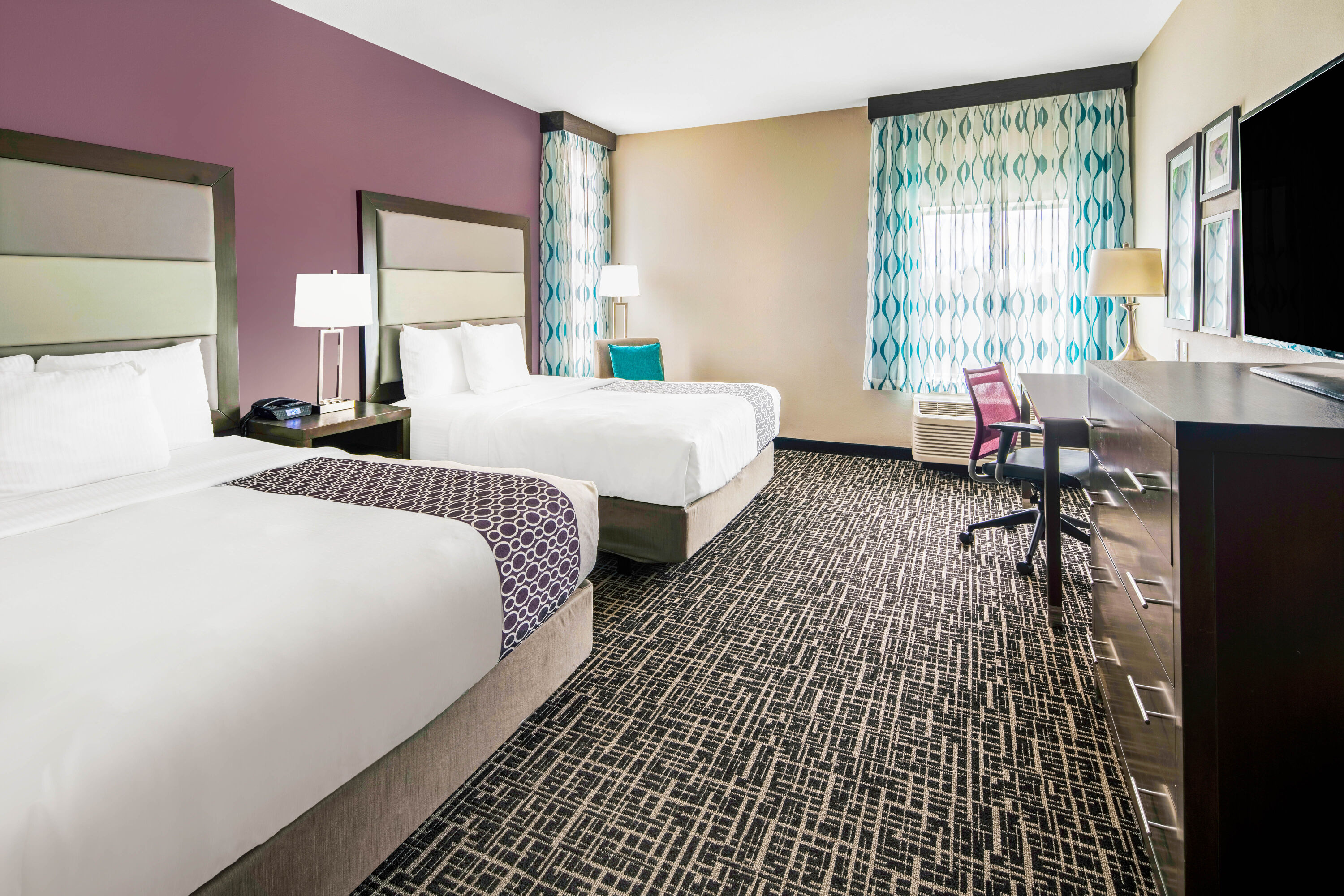 Guest room at the La Quinta Inn & Suites by Wyndham McAllen La Plaza Mall in McAllen, Texas