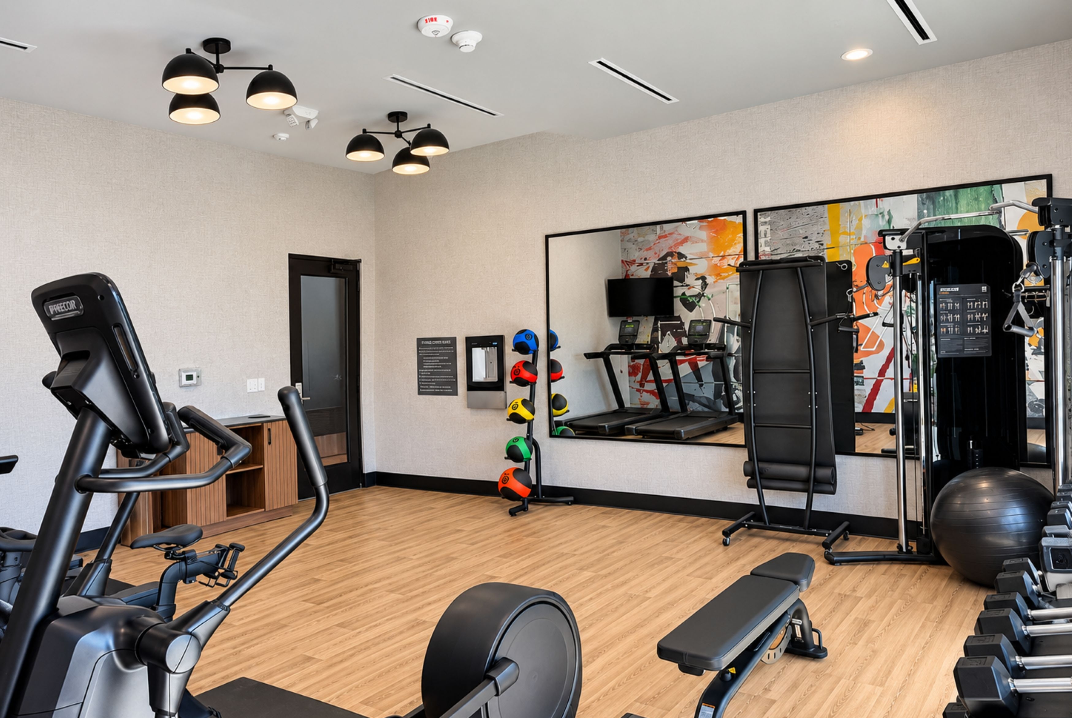 Fitness room at La Quinta Inn and Suites by Wyndham Central McKinney in Mckinney, Texas