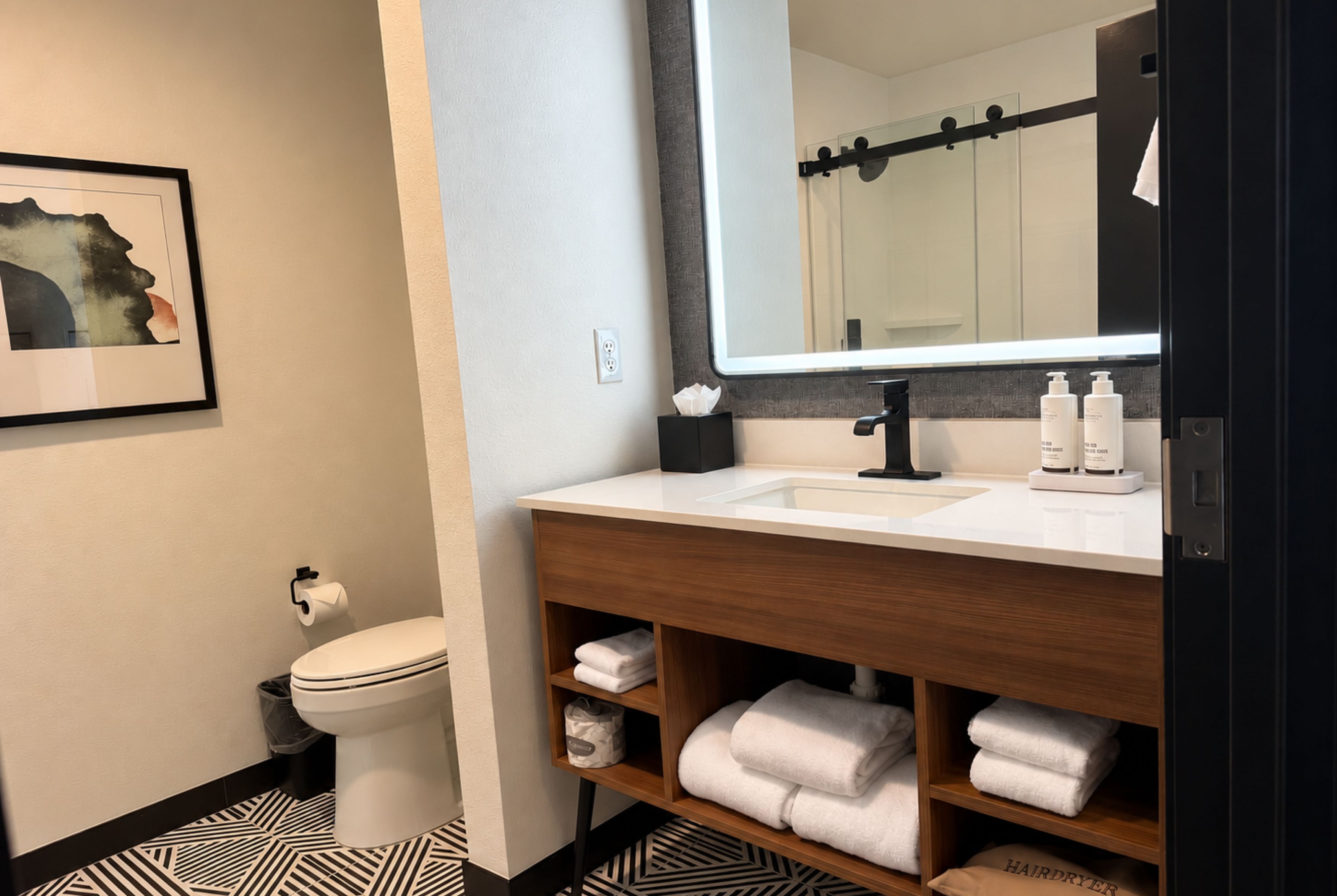 Guest room bath at the La Quinta Inn and Suites by Wyndham Central McKinney in Mckinney, Texas