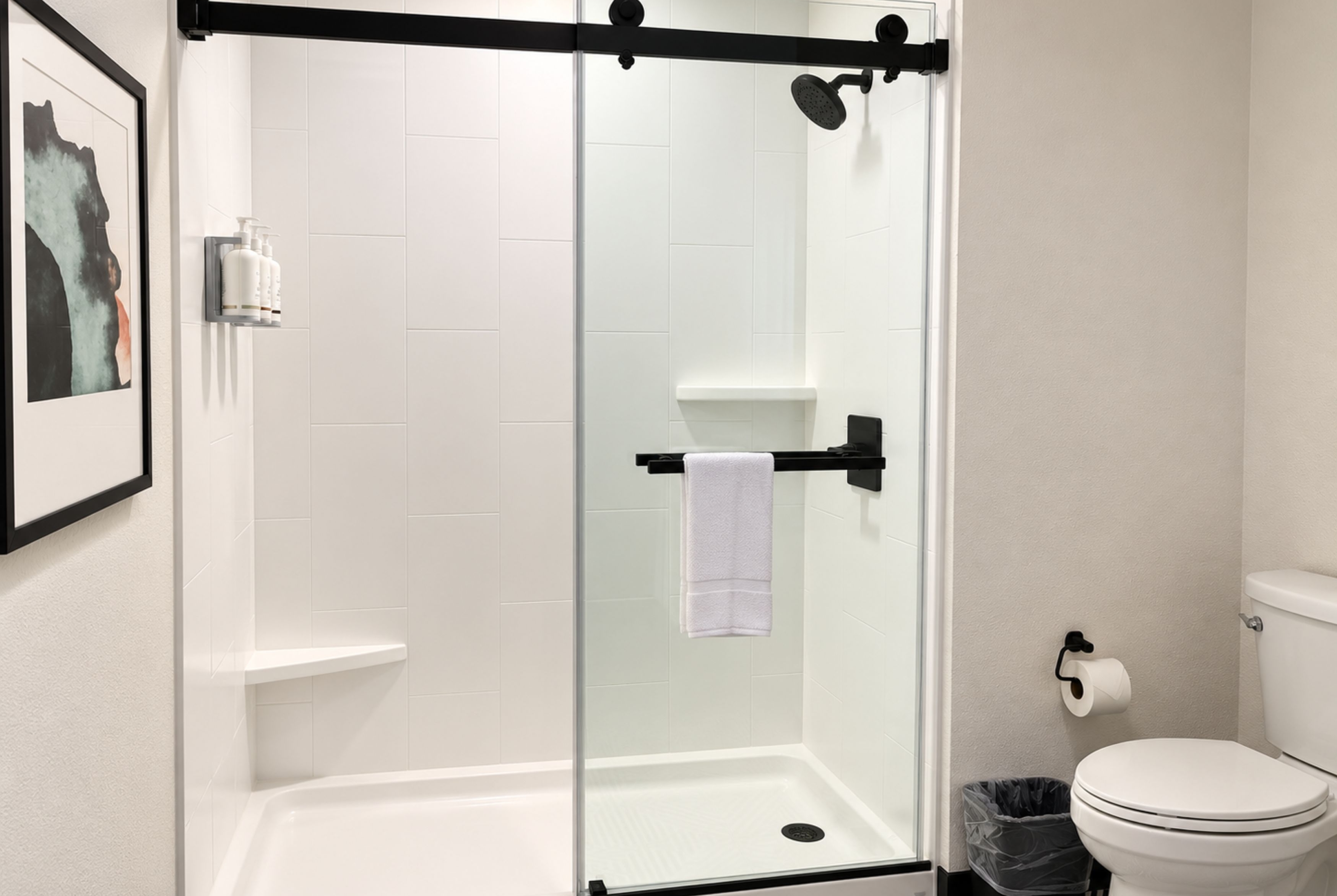 Guest room bath at the La Quinta Inn and Suites by Wyndham Central McKinney in Mckinney, Texas