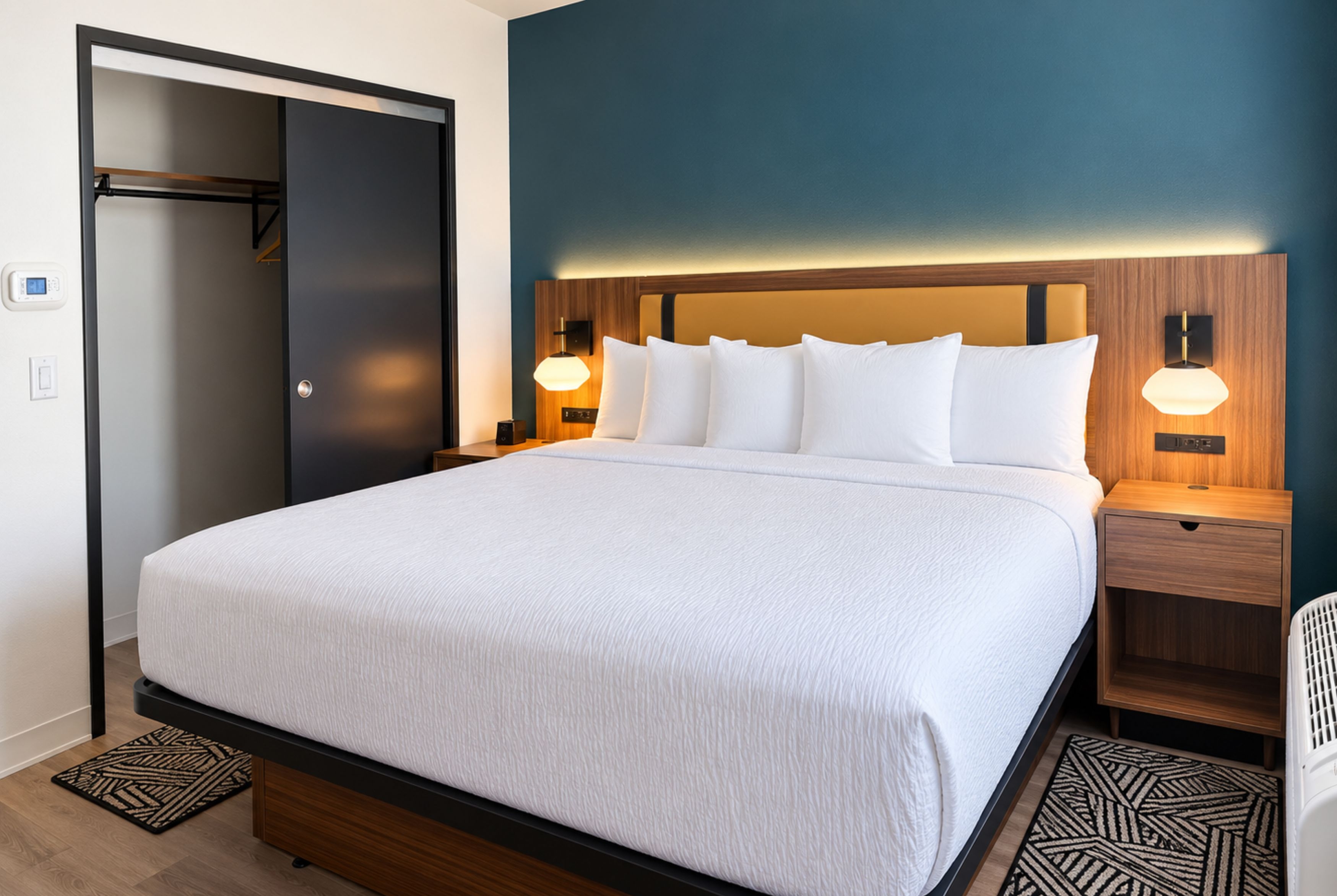 Guest room at the La Quinta Inn and Suites by Wyndham Central McKinney in Mckinney, Texas