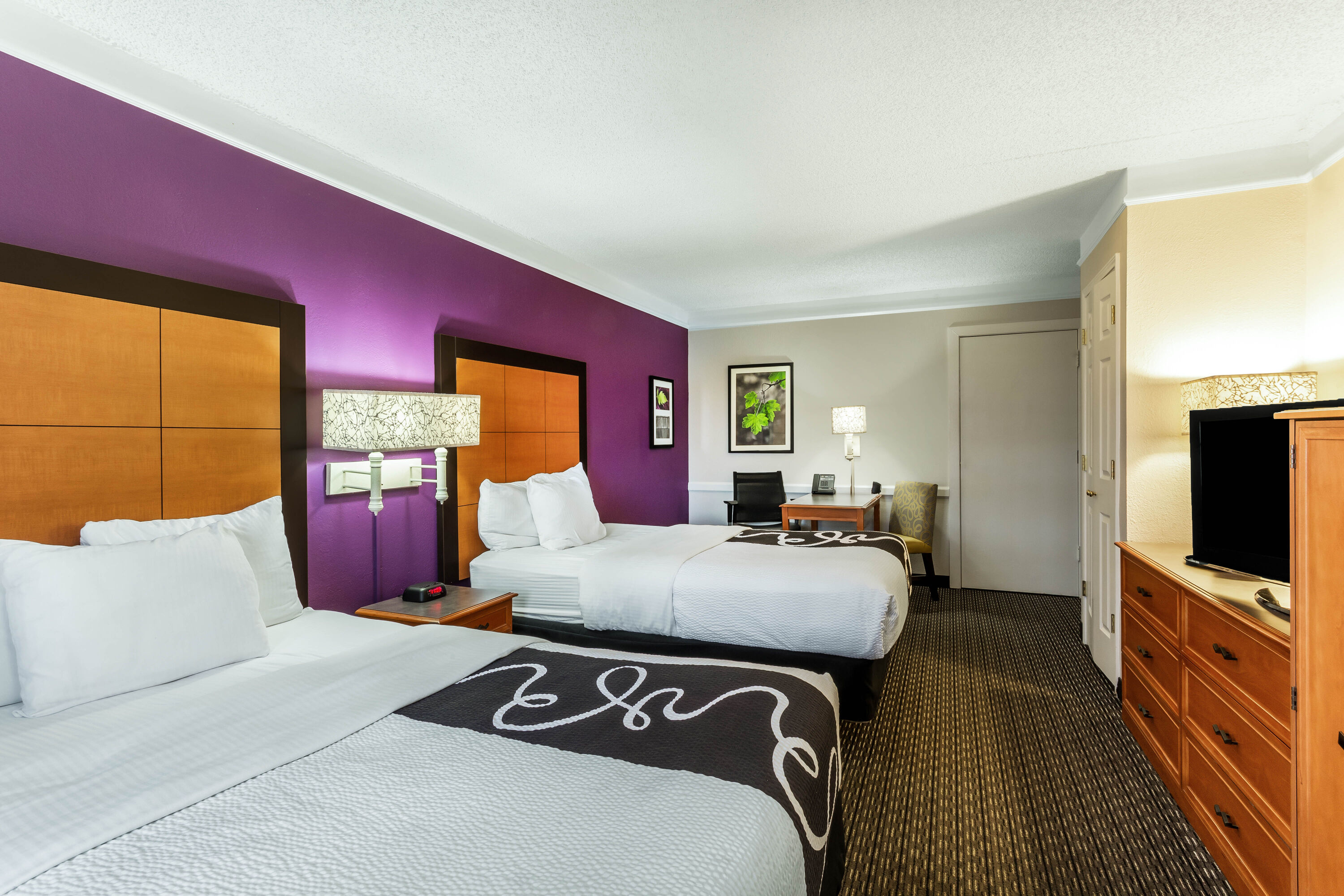 Guest room at the La Quinta Inn by Wyndham Odessa in Odessa, Texas