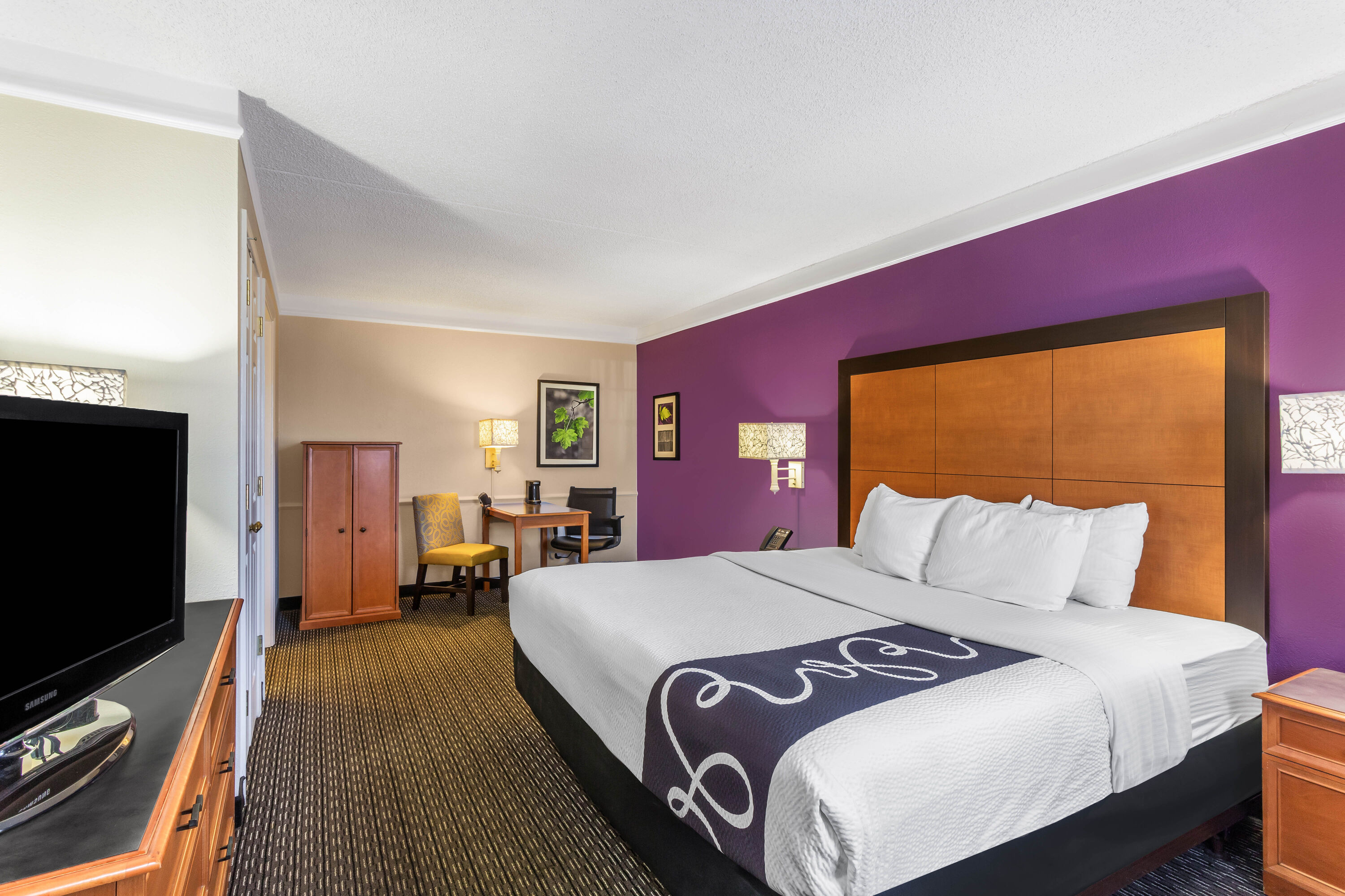 Guest room at the La Quinta Inn by Wyndham Odessa in Odessa, Texas