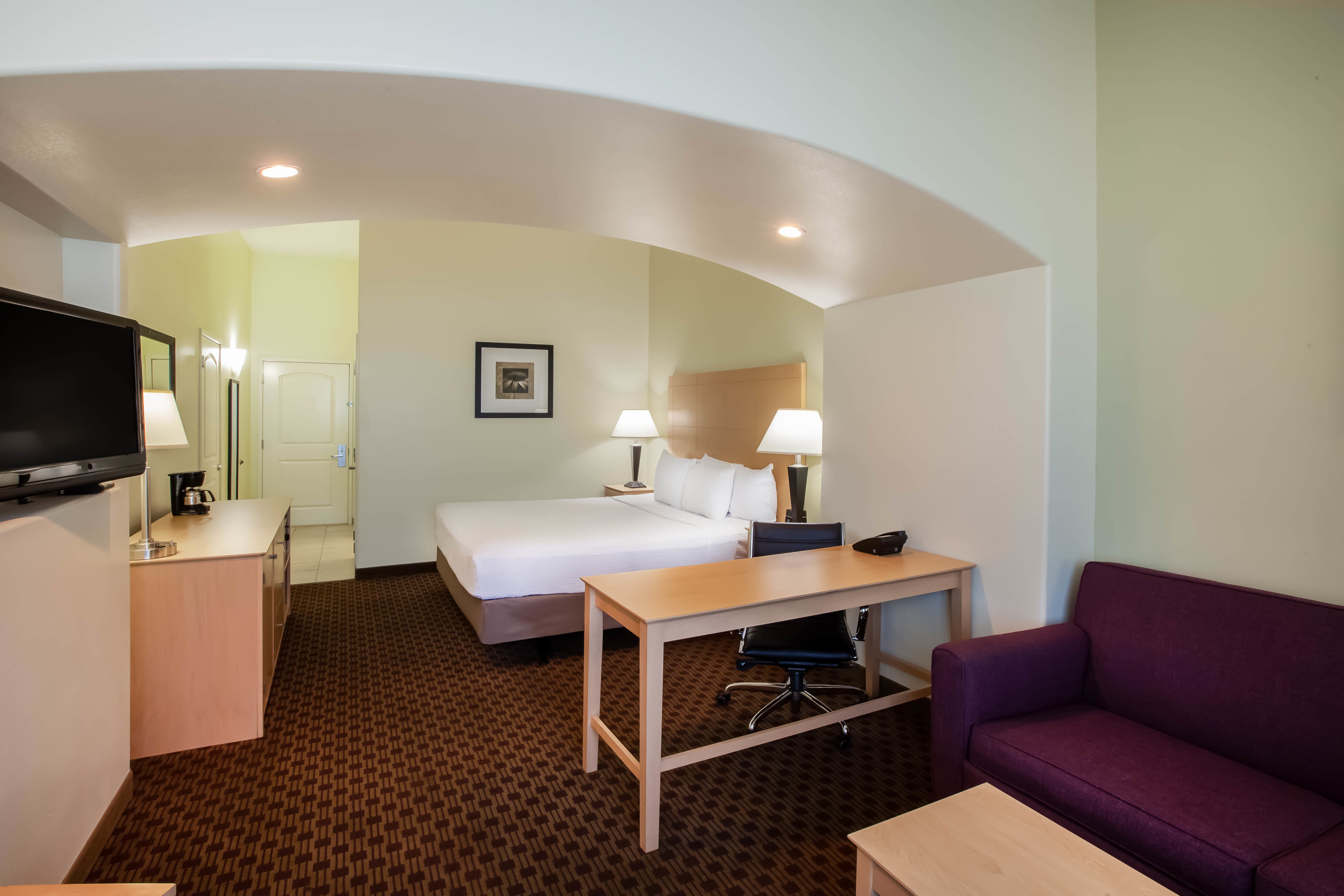 Guest room at the La Quinta Inn & Suites by Wyndham Odessa North in Odessa, Texas