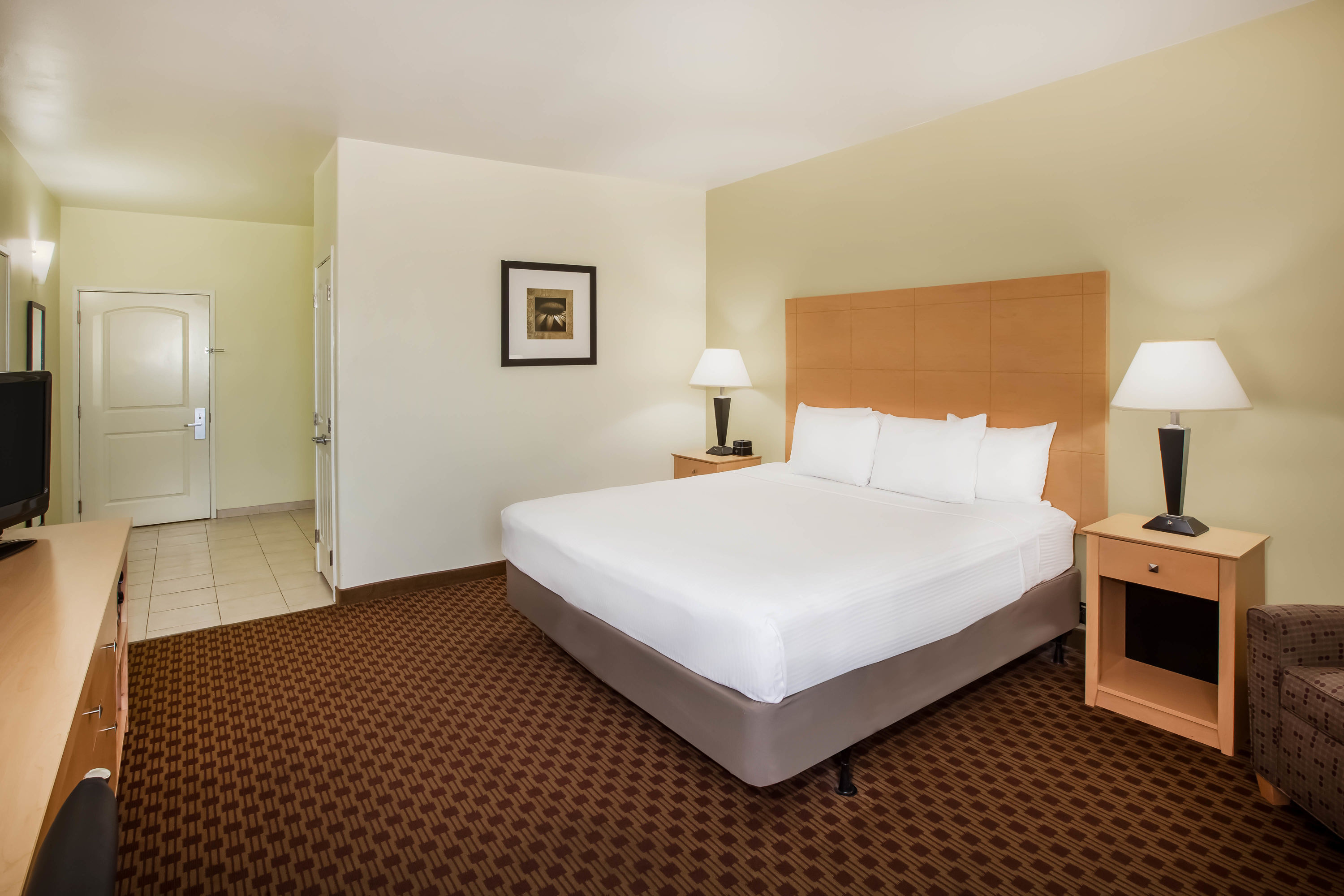 Guest room at the La Quinta Inn & Suites by Wyndham Odessa North in Odessa, Texas