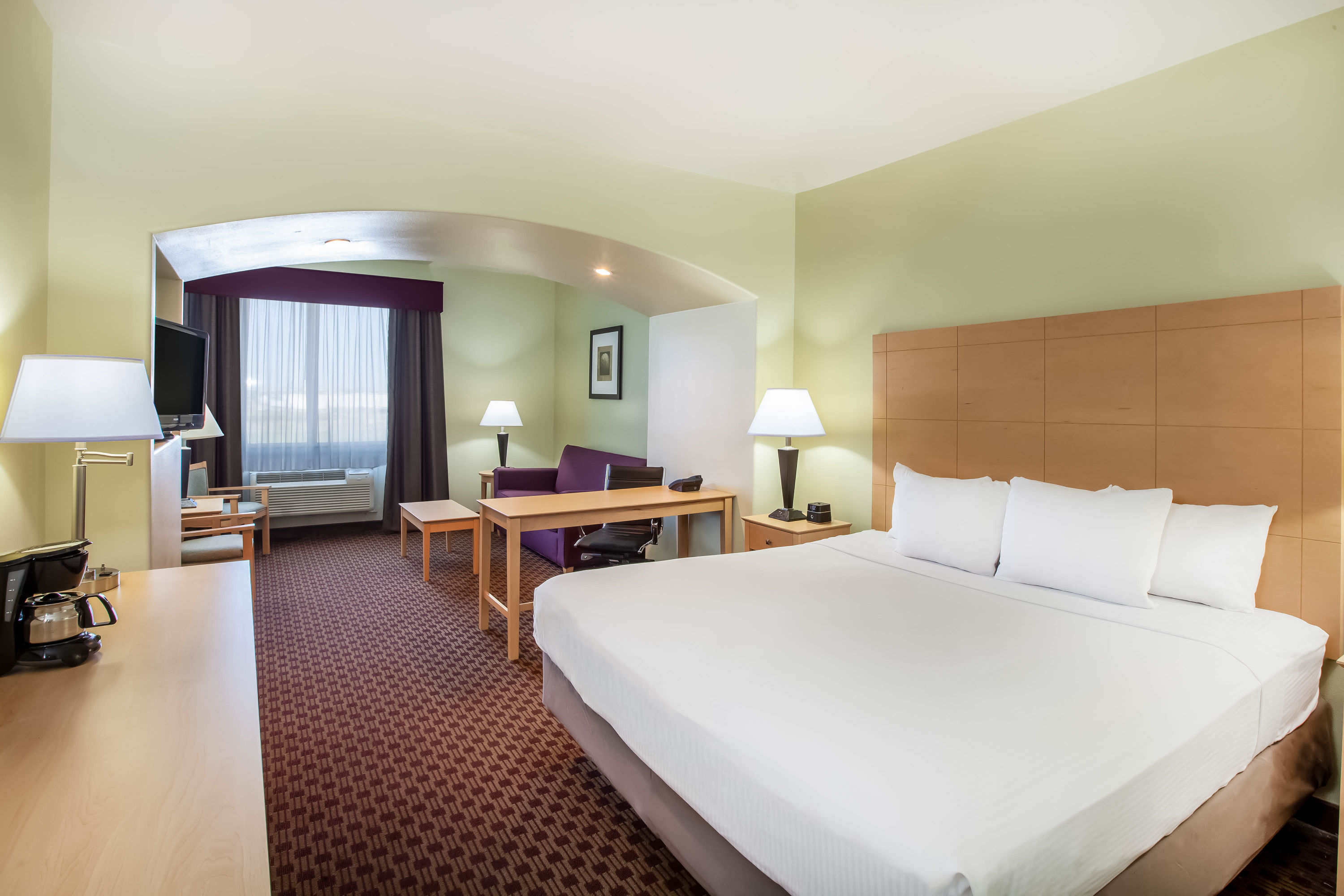 Guest room at the La Quinta Inn & Suites by Wyndham Odessa North in Odessa, Texas