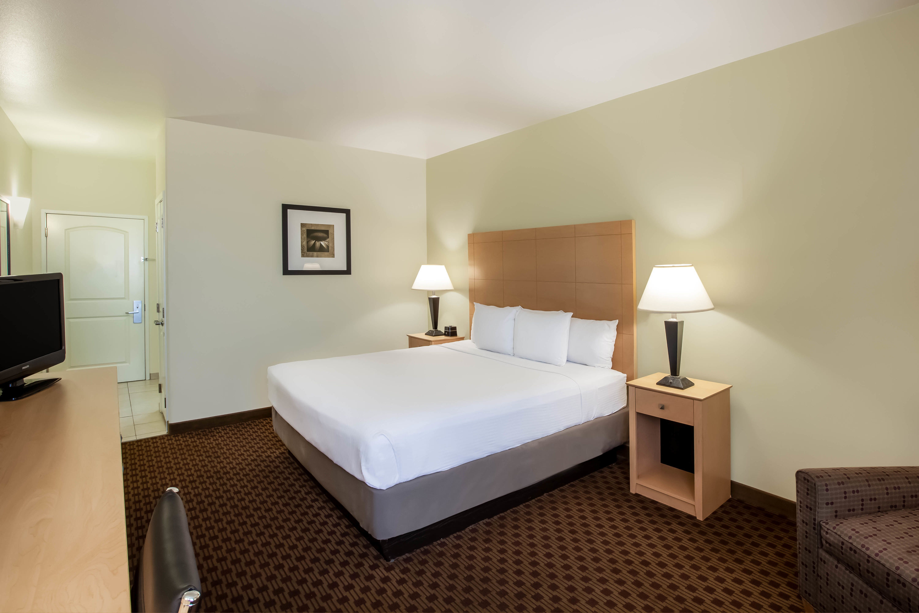 Guest room at the La Quinta Inn & Suites by Wyndham Odessa North in Odessa, Texas