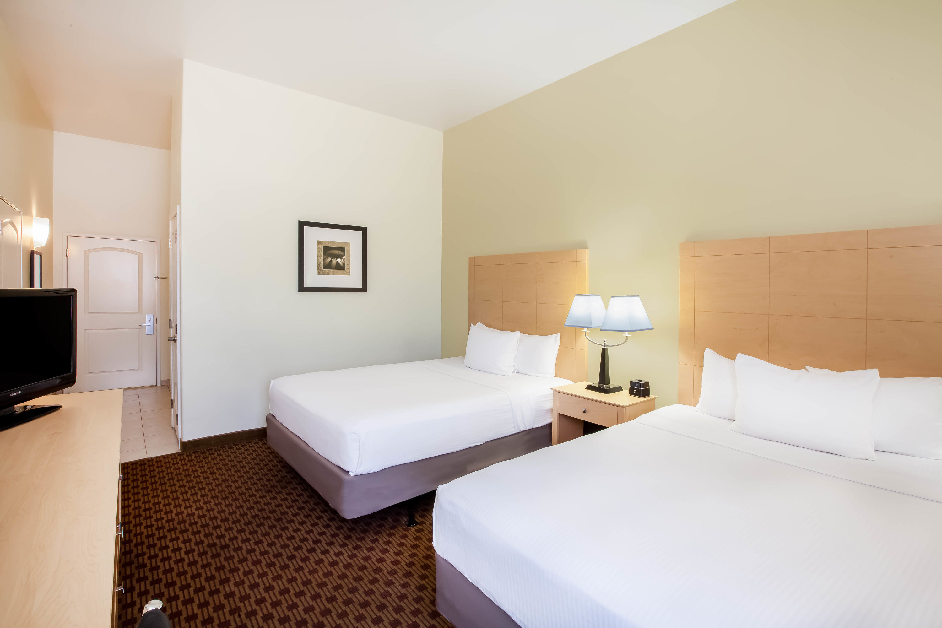 Guest room at the La Quinta Inn & Suites by Wyndham Odessa North in Odessa, Texas