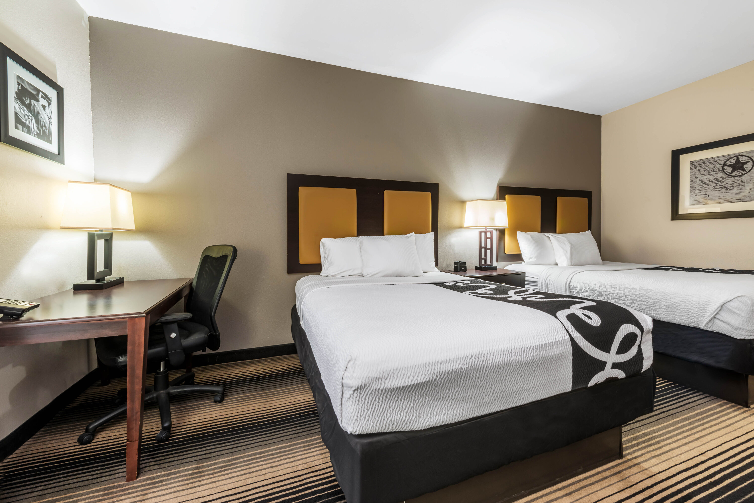 Guest room at the La Quinta Inn & Suites by Wyndham Orange in Orange, Texas