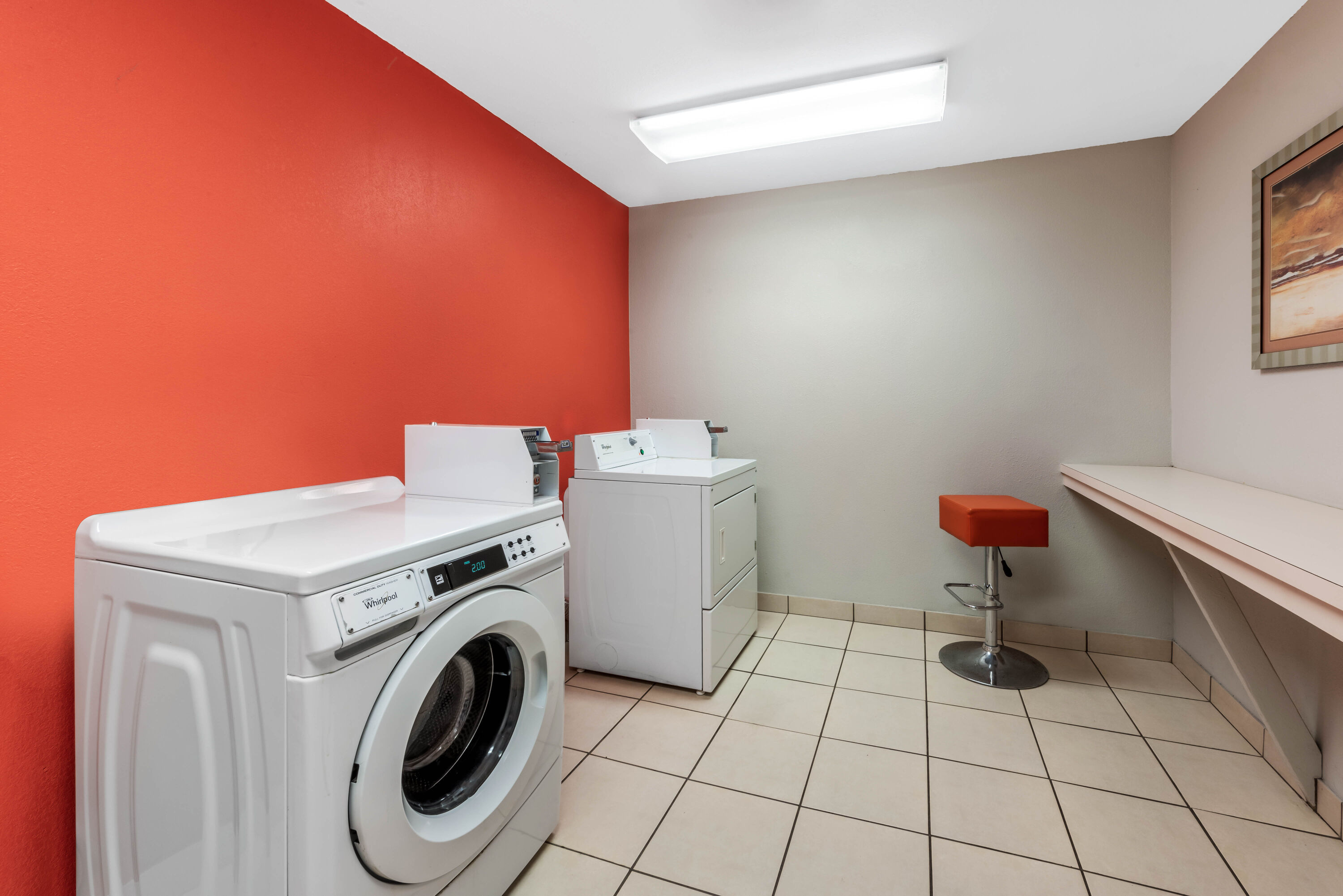 Laundry facilities at La Quinta Inn & Suites by Wyndham Orange in Orange, Texas
