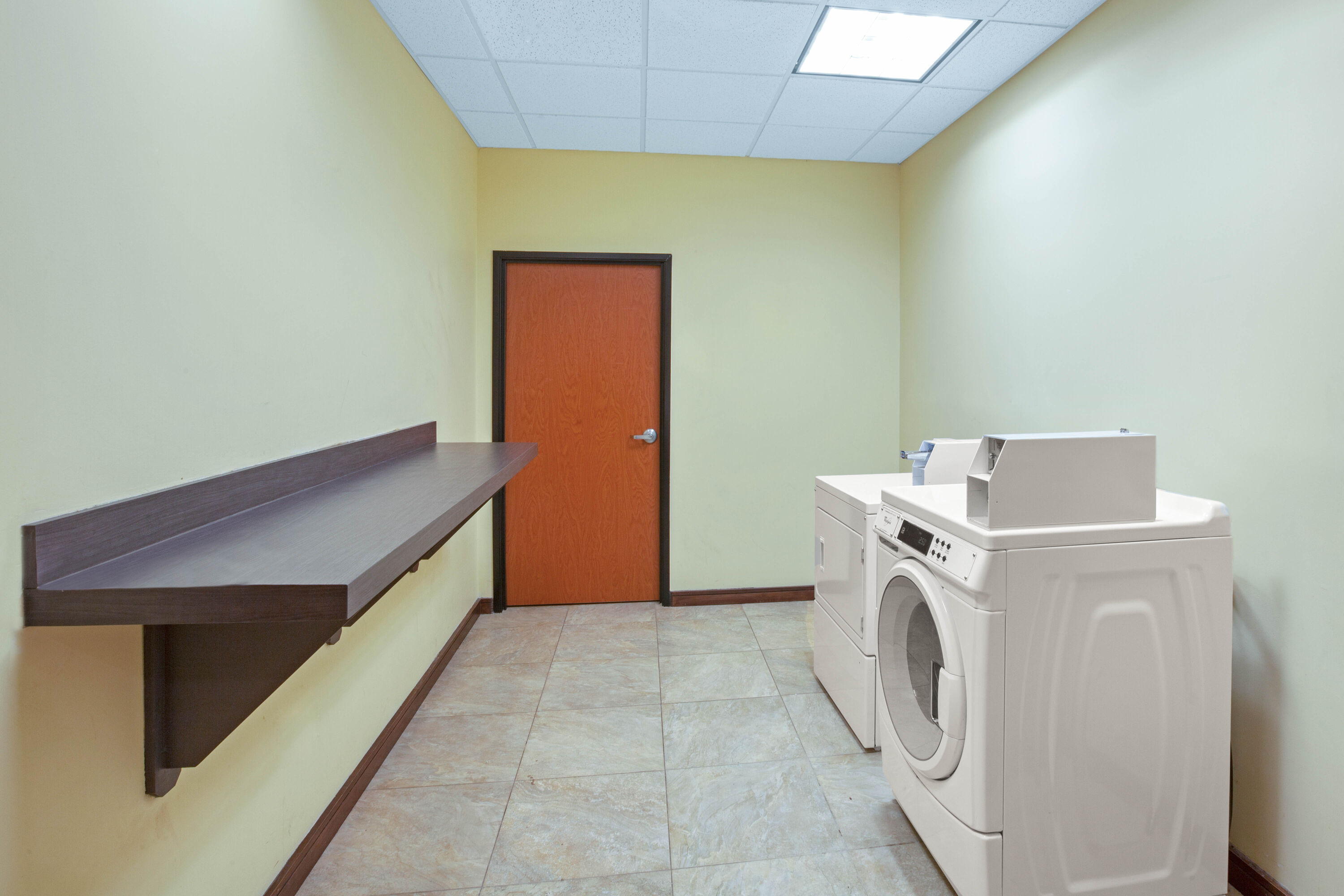Laundry facilities at La Quinta Inn & Suites by Wyndham Pasadena North in Pasadena, Texas
