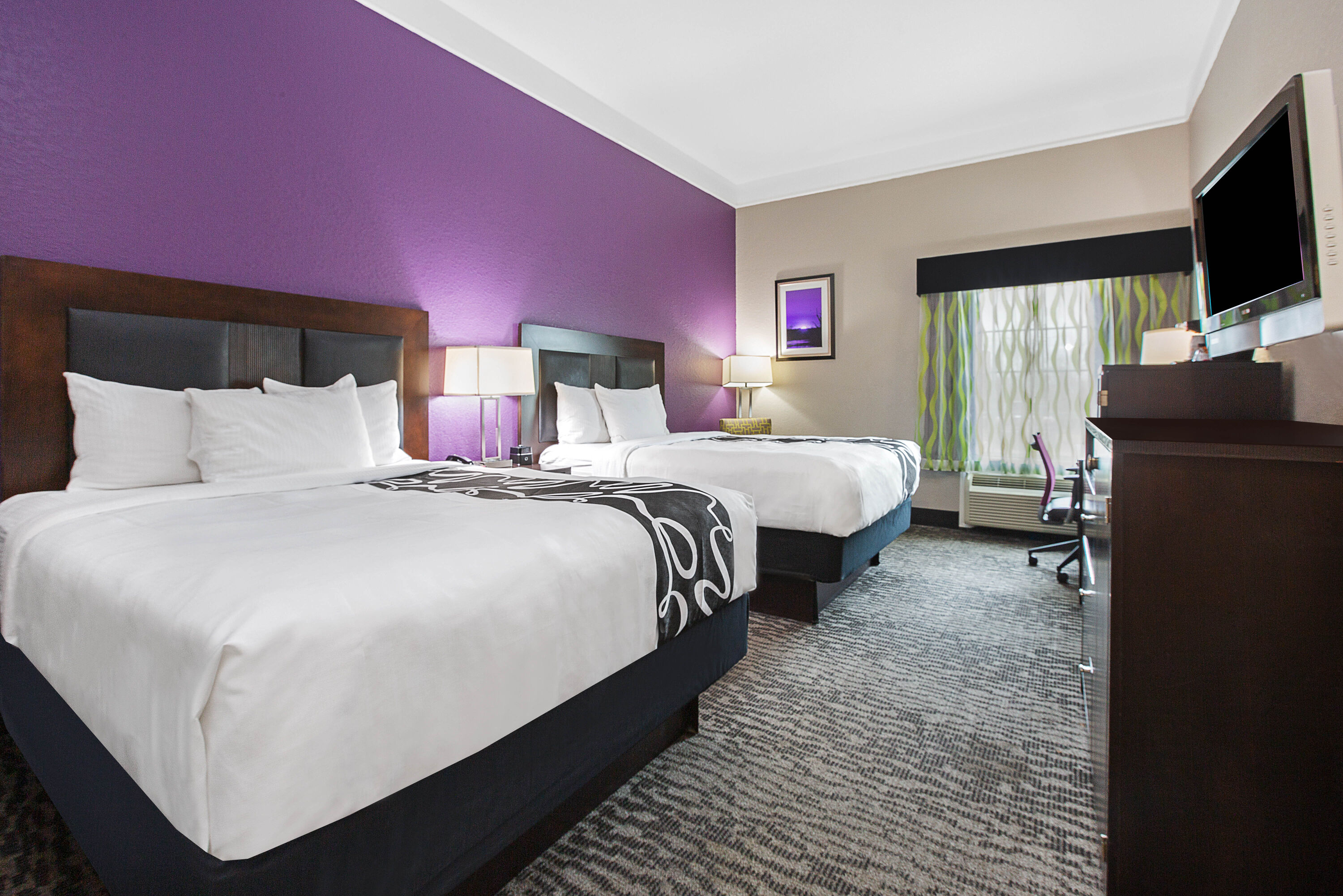 Guest room at the La Quinta Inn & Suites by Wyndham Pearland - Houston South in Pearland, Texas