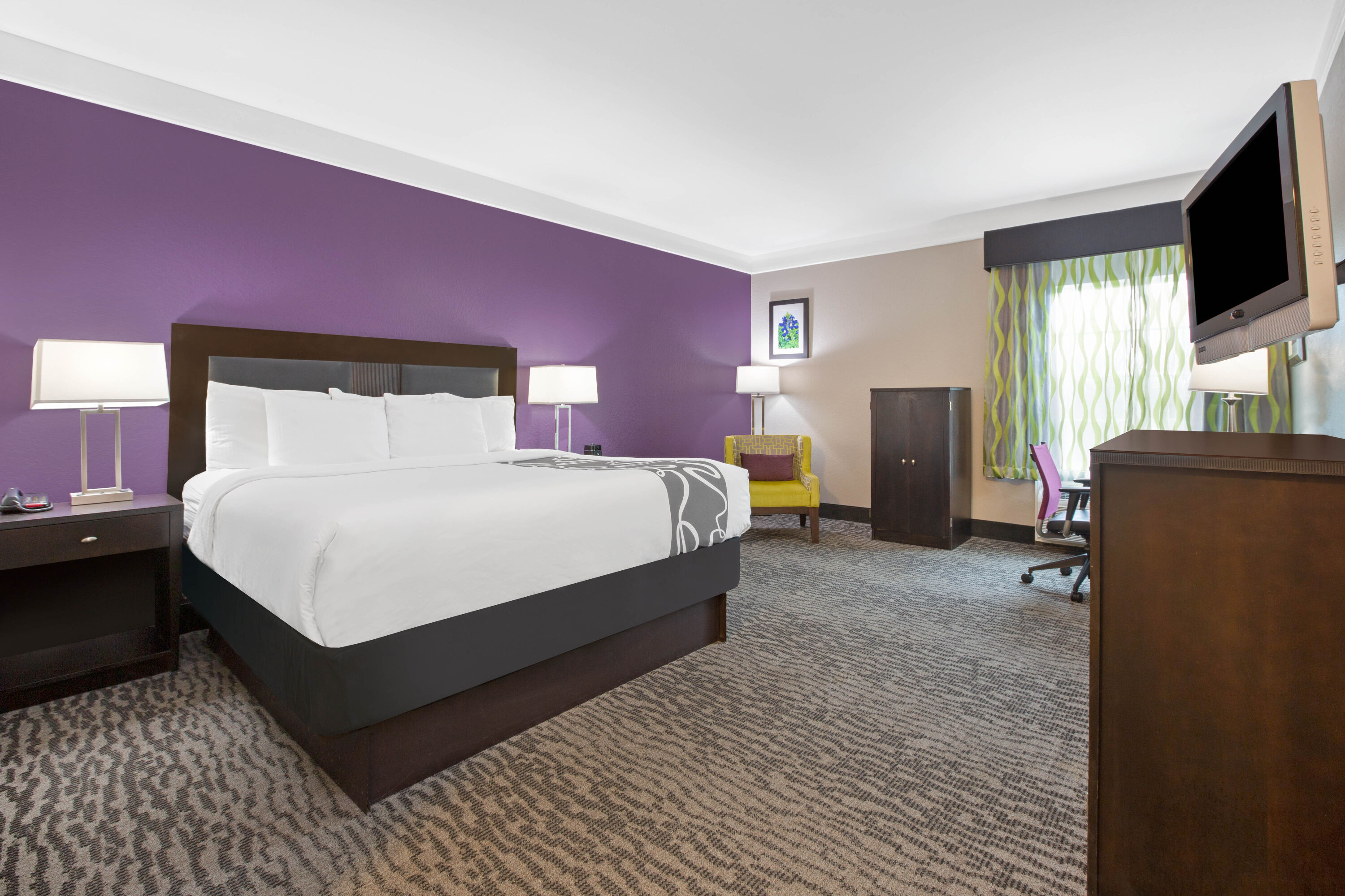 Guest room at the La Quinta Inn & Suites by Wyndham Pearland - Houston South in Pearland, Texas