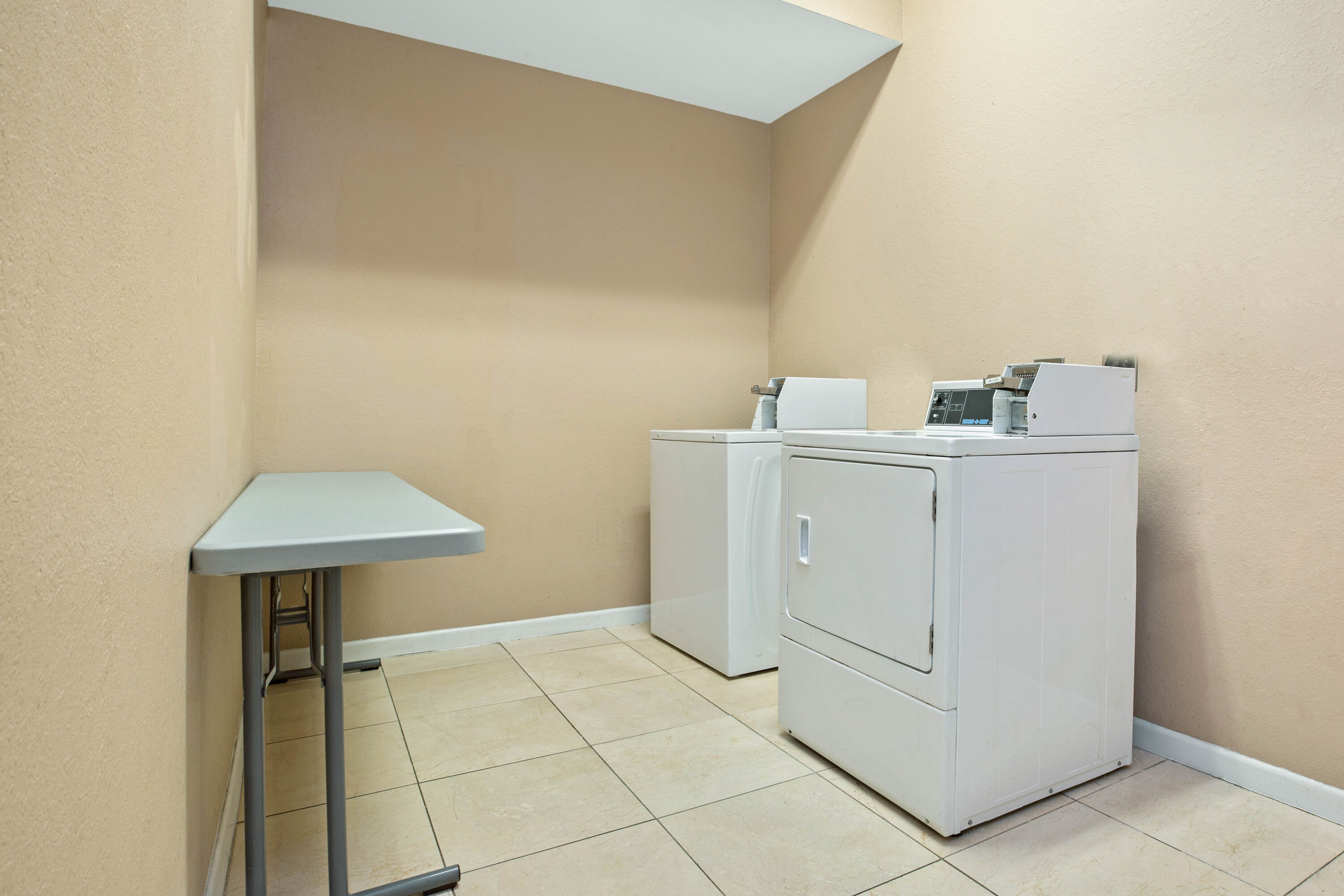 Laundry facilities at La Quinta Inn & Suites by Wyndham Pearland - Houston South in Pearland, Texas