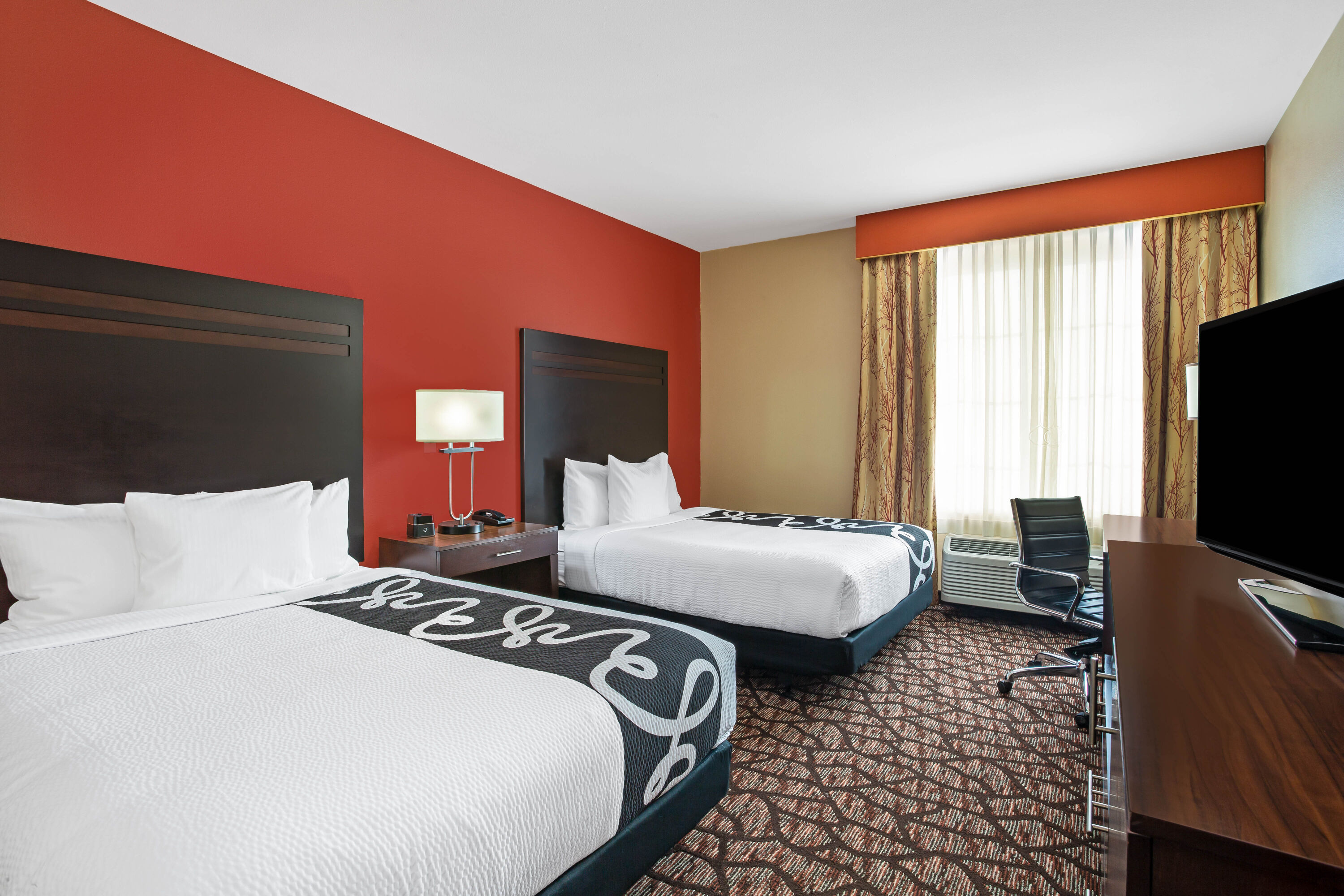 Guest room at the La Quinta Inn & Suites by Wyndham Pecos in Pecos, Texas