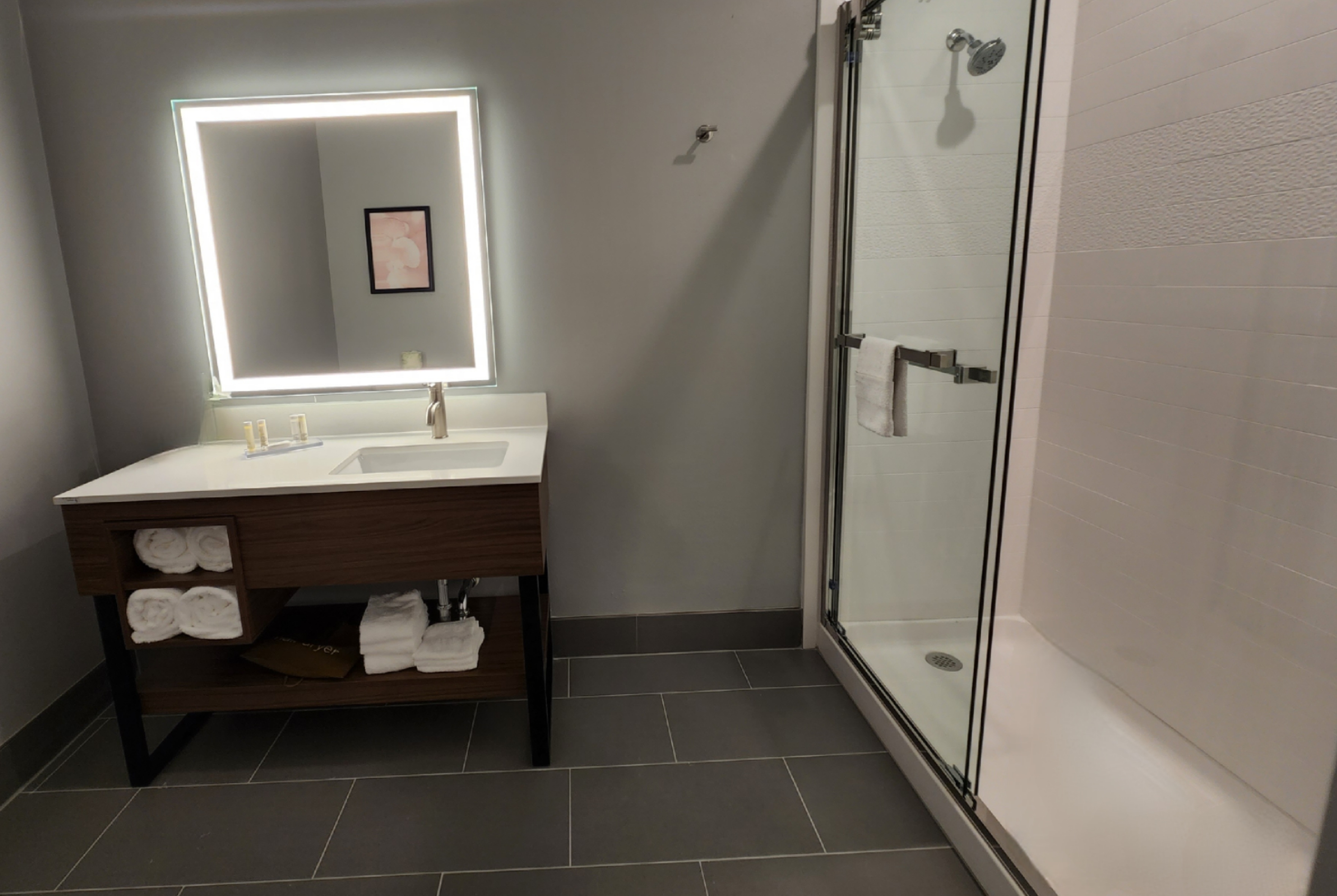 Guest room bath at the La Quinta Inn & Suites by Wyndham Pflugerville in Pflugerville, Texas